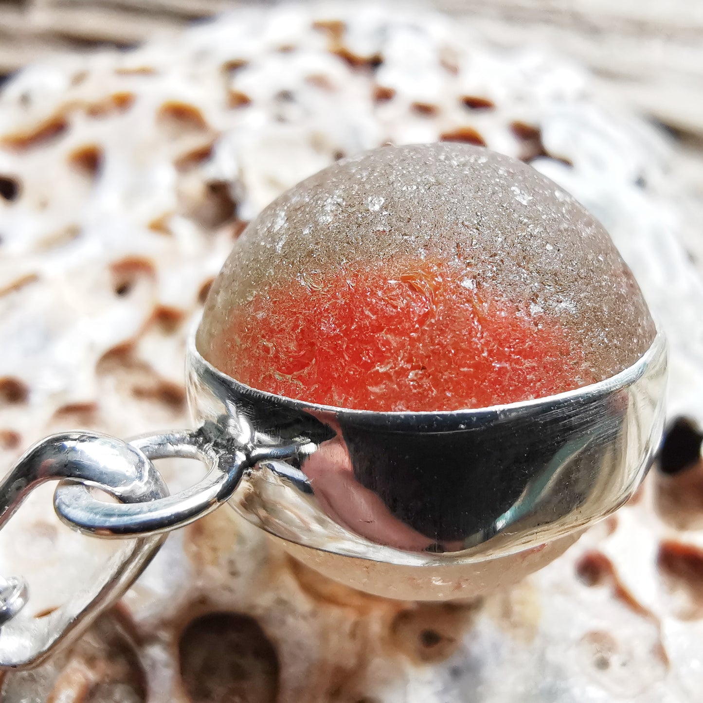 Scottish genuine orange sea glass marble & sterling silver pendant.