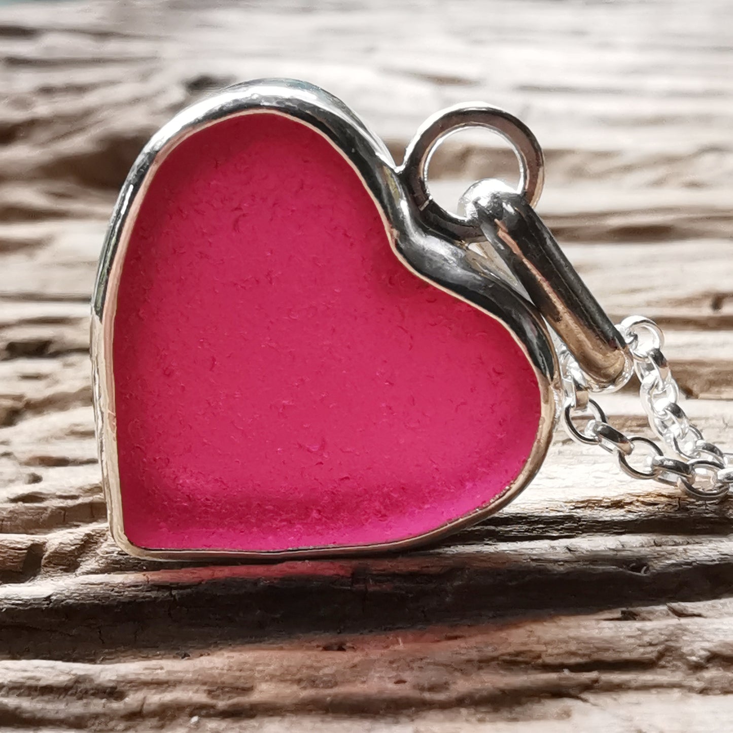 Magenta pink sea glass heart & sterling silver pendant.