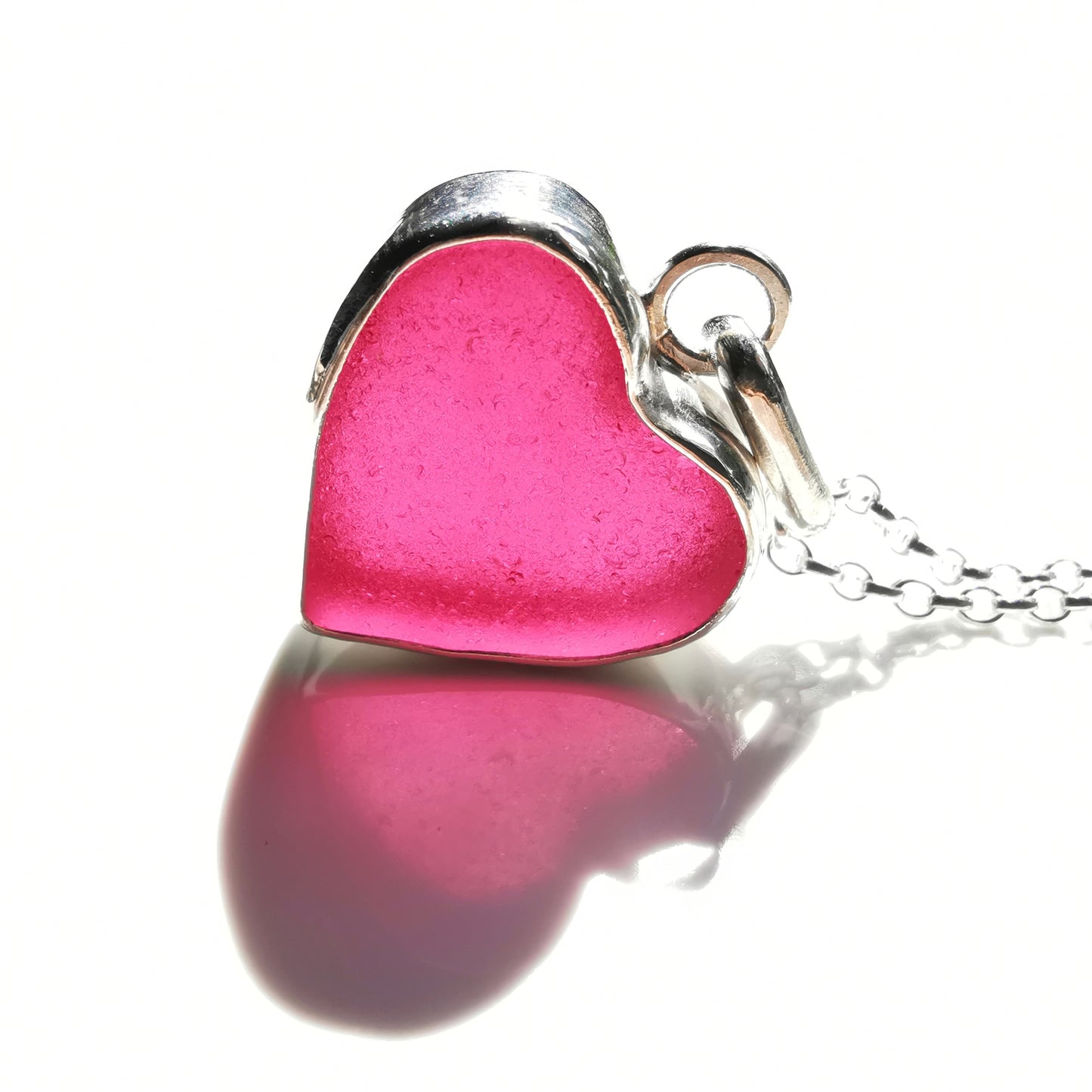 Magenta pink sea glass heart & sterling silver pendant.