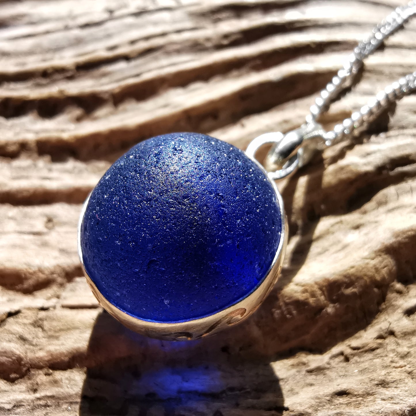 Scottish cobalt blue sea glass marble & sterling silver pendant.