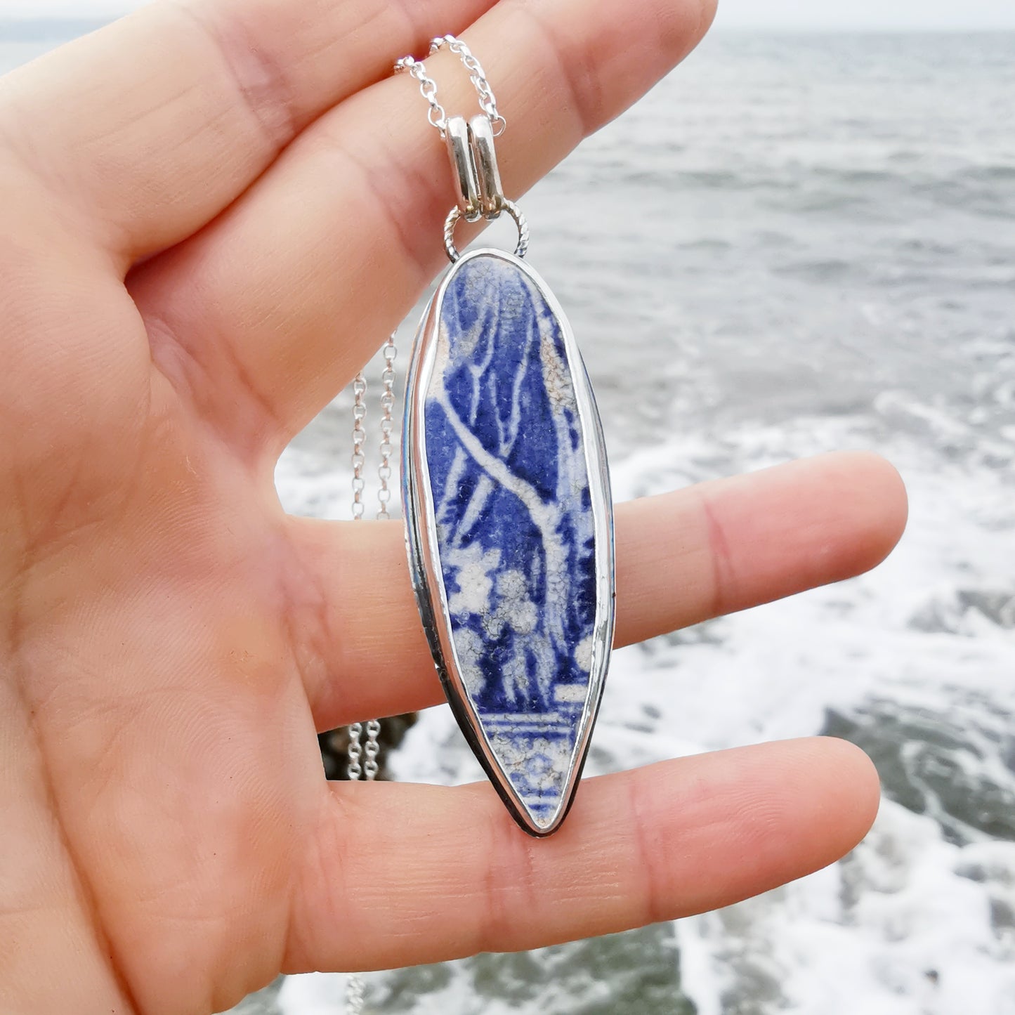 Scottish blue willow pattern pottery & sterling silver pendant.