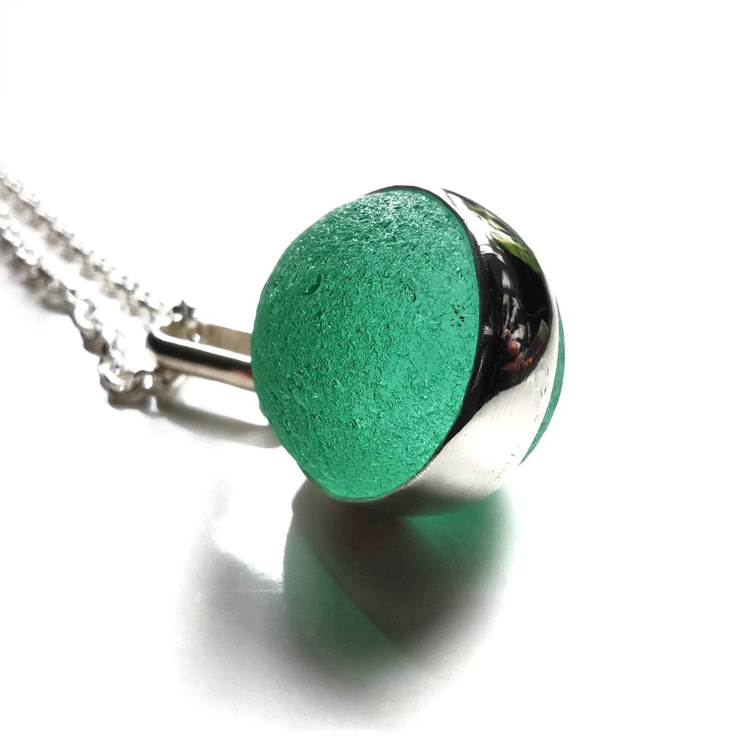 Scottish teal green sea glass marble & sterling silver pendant.