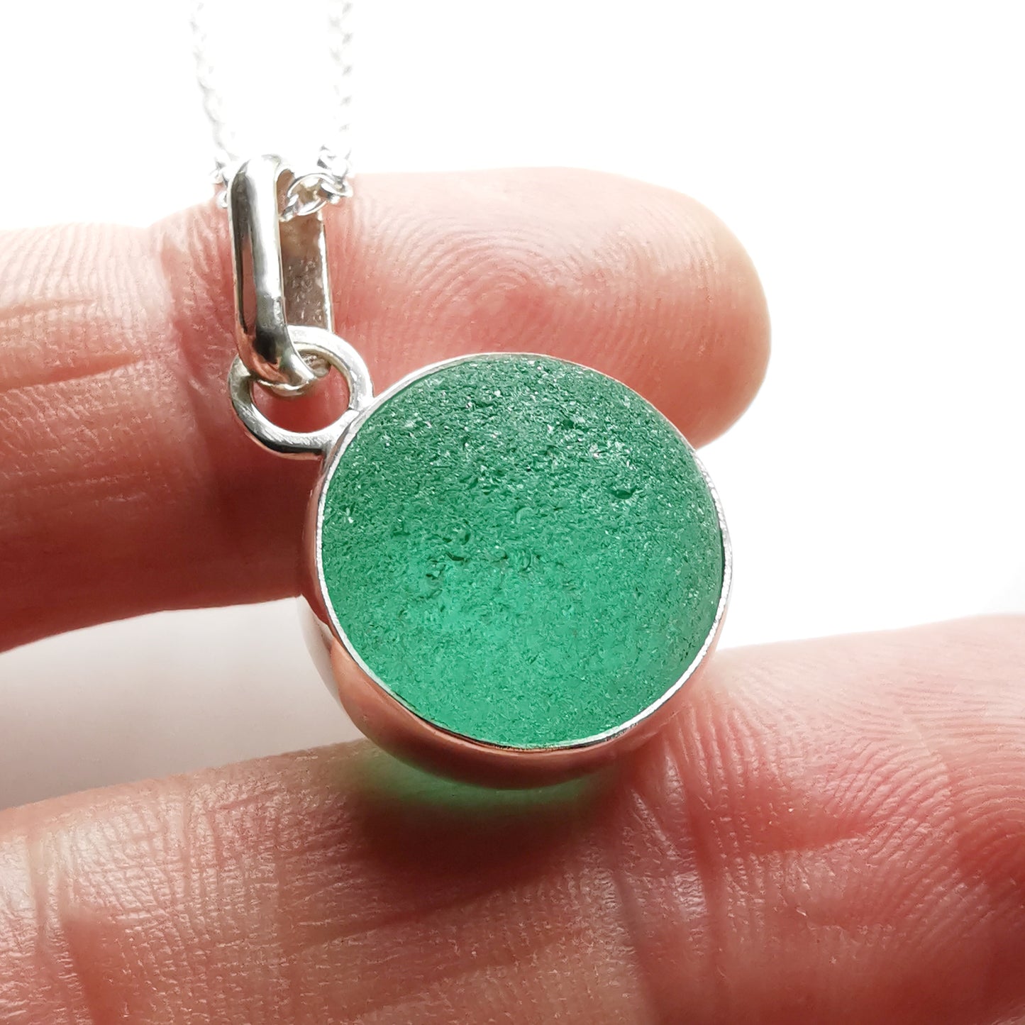 Scottish teal green sea glass marble & sterling silver pendant.