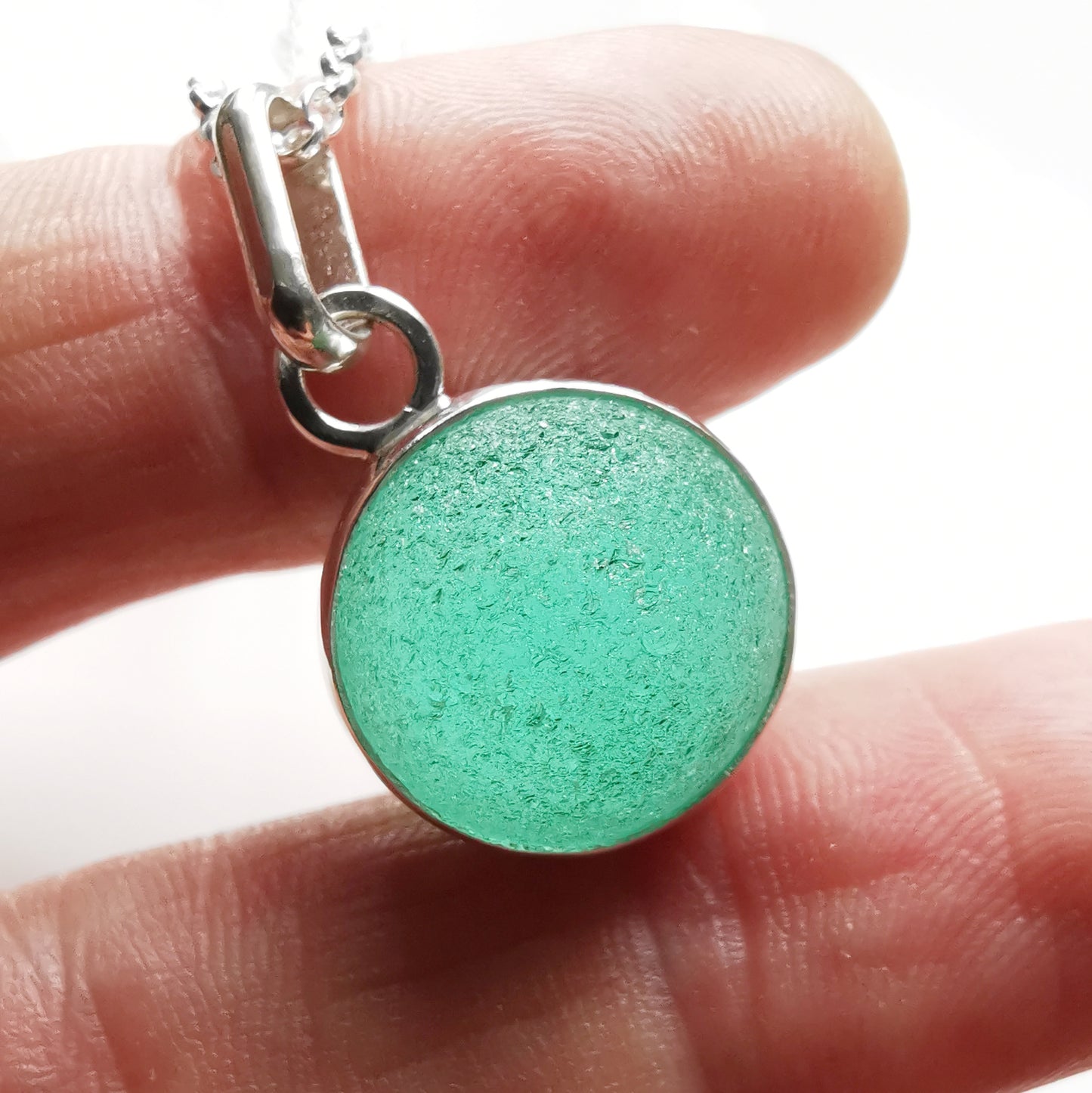 Scottish teal green sea glass marble & sterling silver pendant.