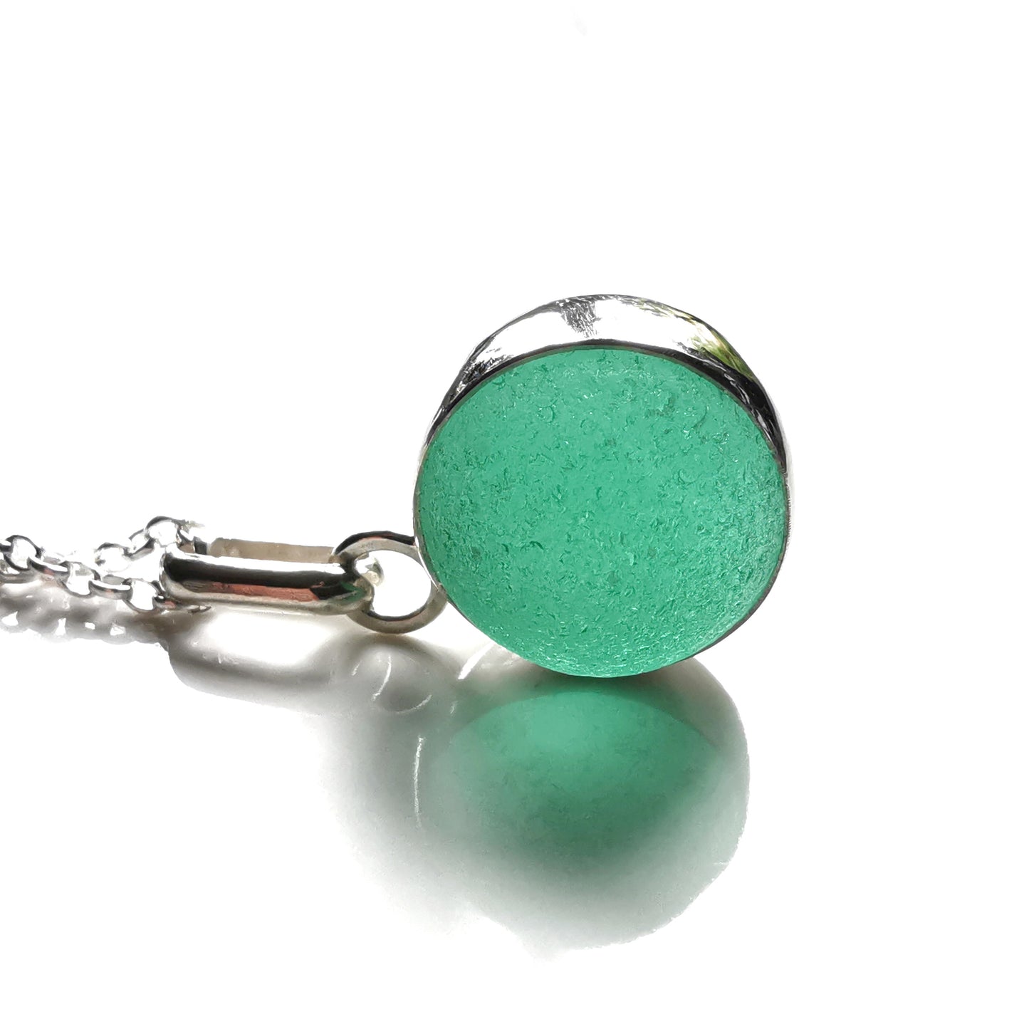 Scottish teal green sea glass marble & sterling silver pendant.