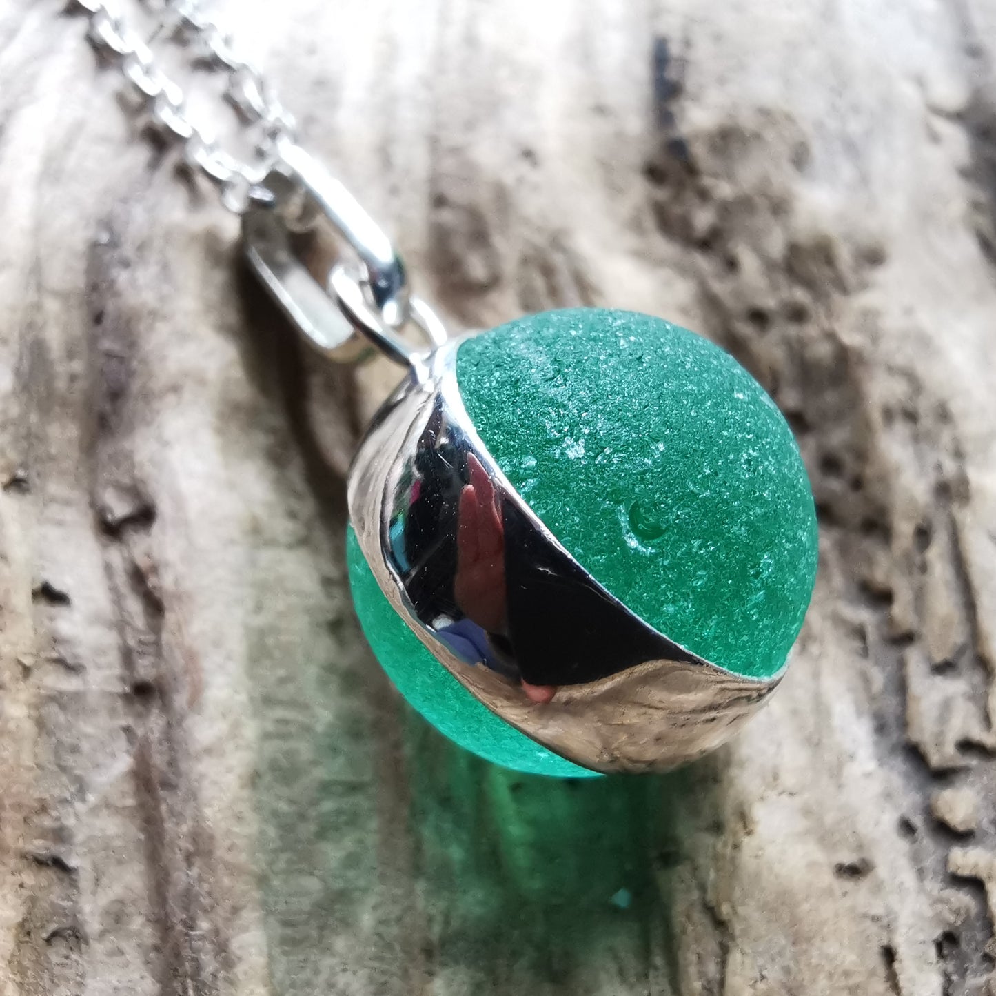 Scottish teal green sea glass marble & sterling silver pendant.