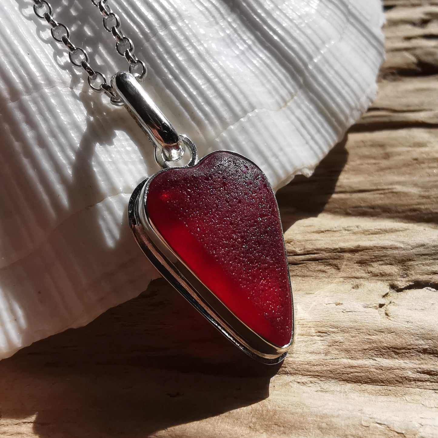 Scottish red sea glass heart & sterling silver pendant.