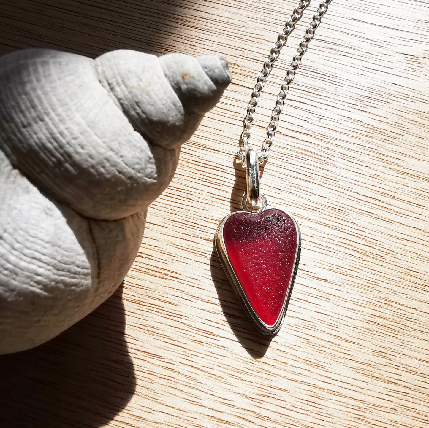 Scottish red sea glass heart & sterling silver pendant.