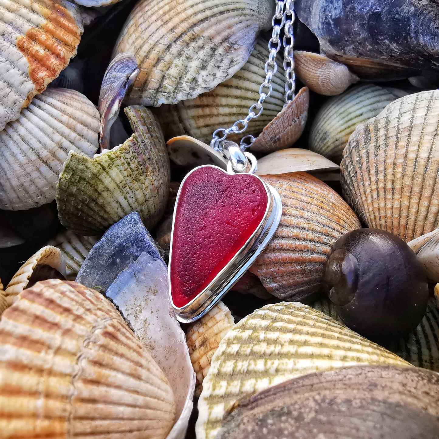 Scottish red sea glass heart & sterling silver pendant.