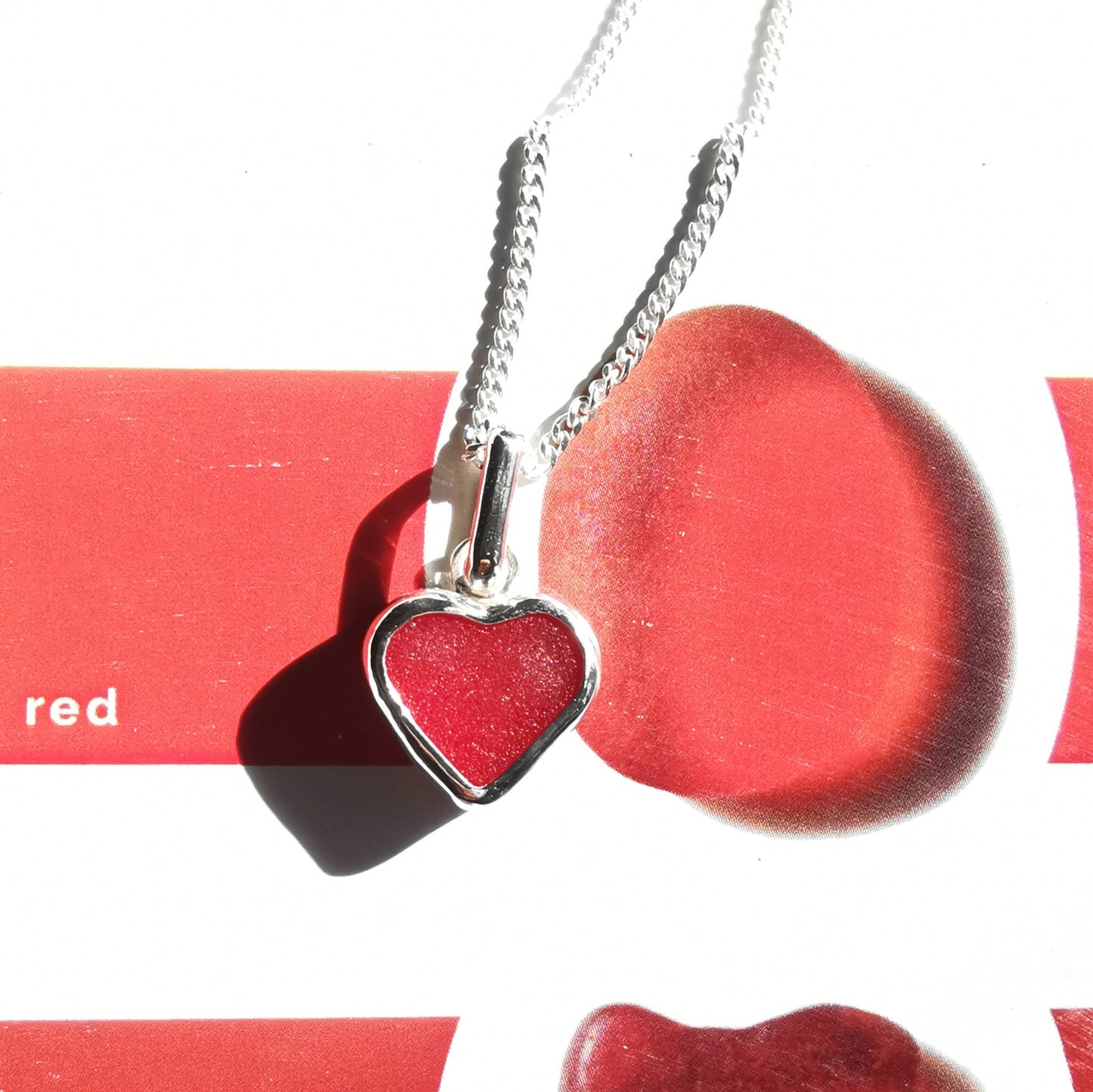 Scottish red sea glass heart & sterling silver pendant.