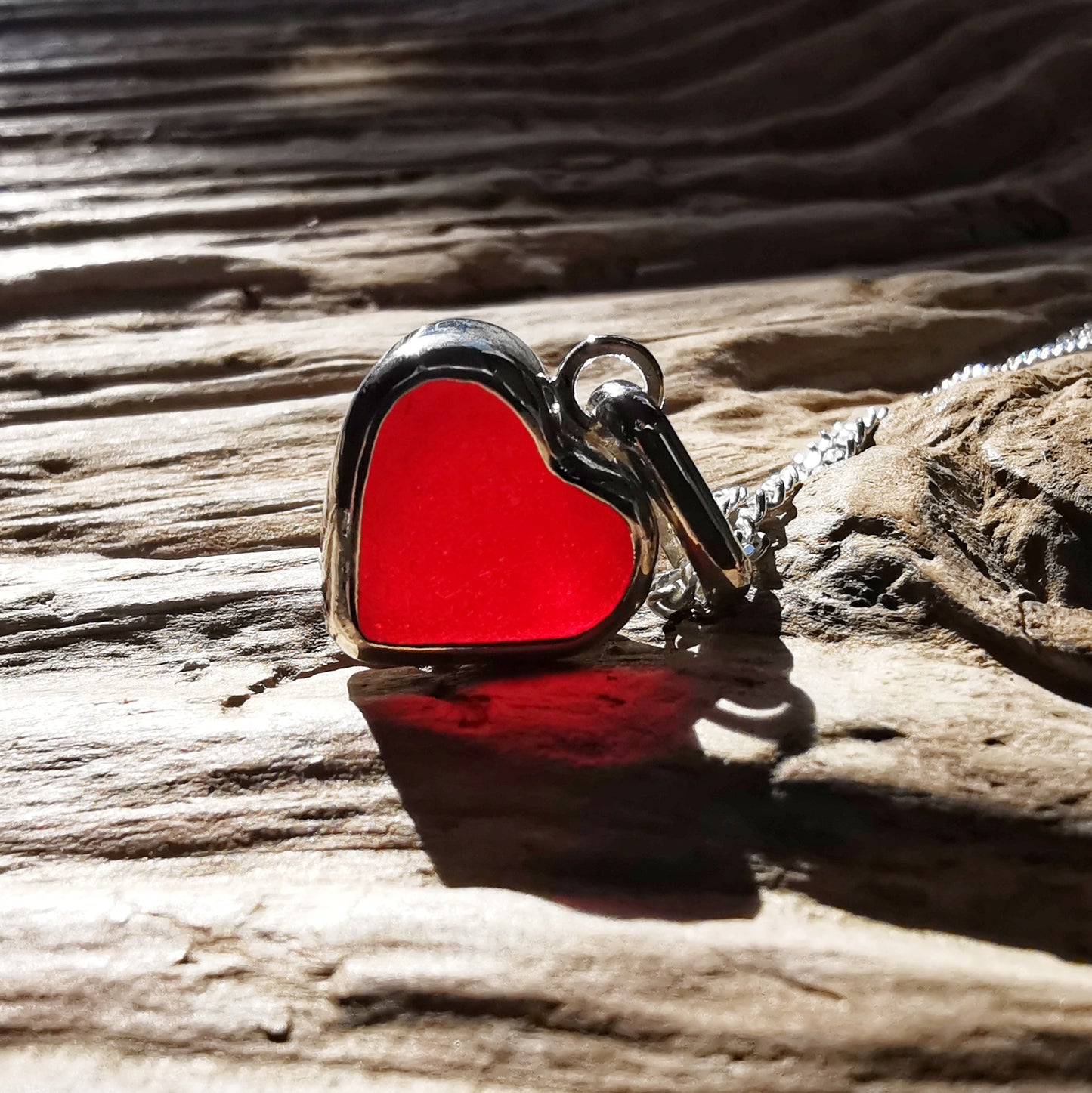 Scottish red sea glass heart & sterling silver pendant.