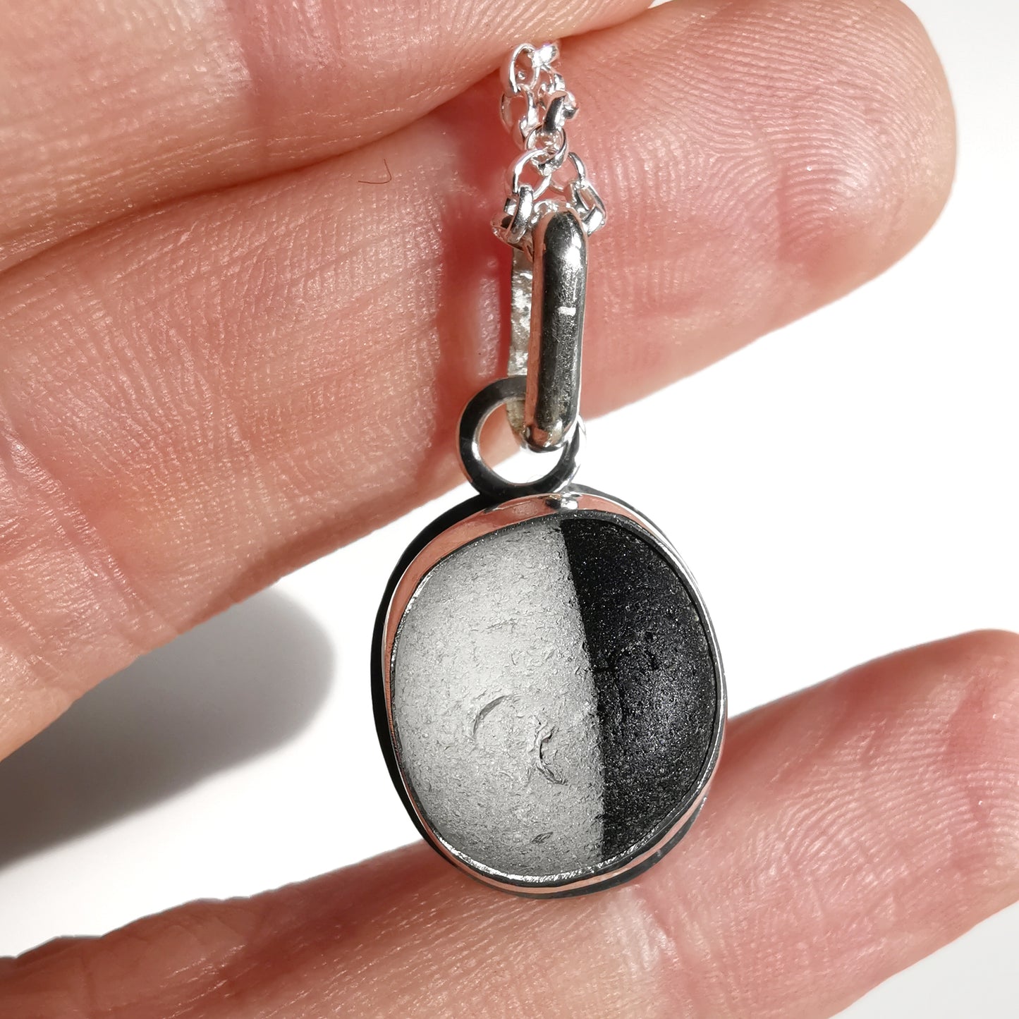 Seaham black and clear multi sea glass & sterling silver pendant.