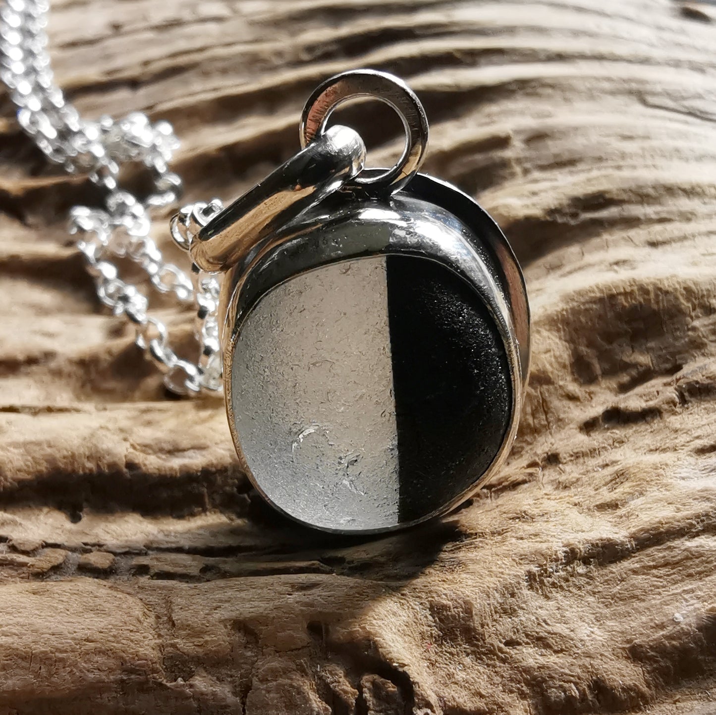 Seaham black and clear multi sea glass & sterling silver pendant.