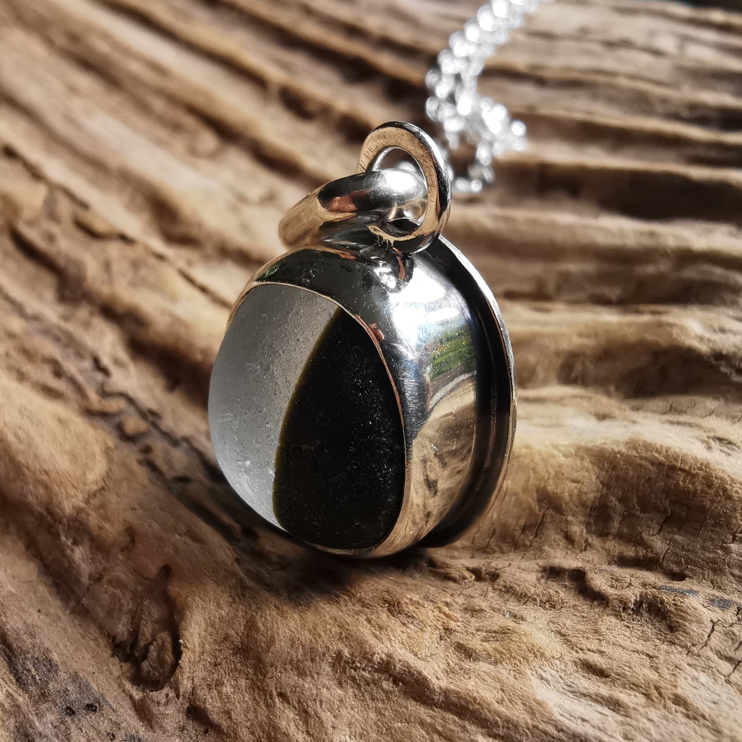 Seaham black and clear multi sea glass & sterling silver pendant.