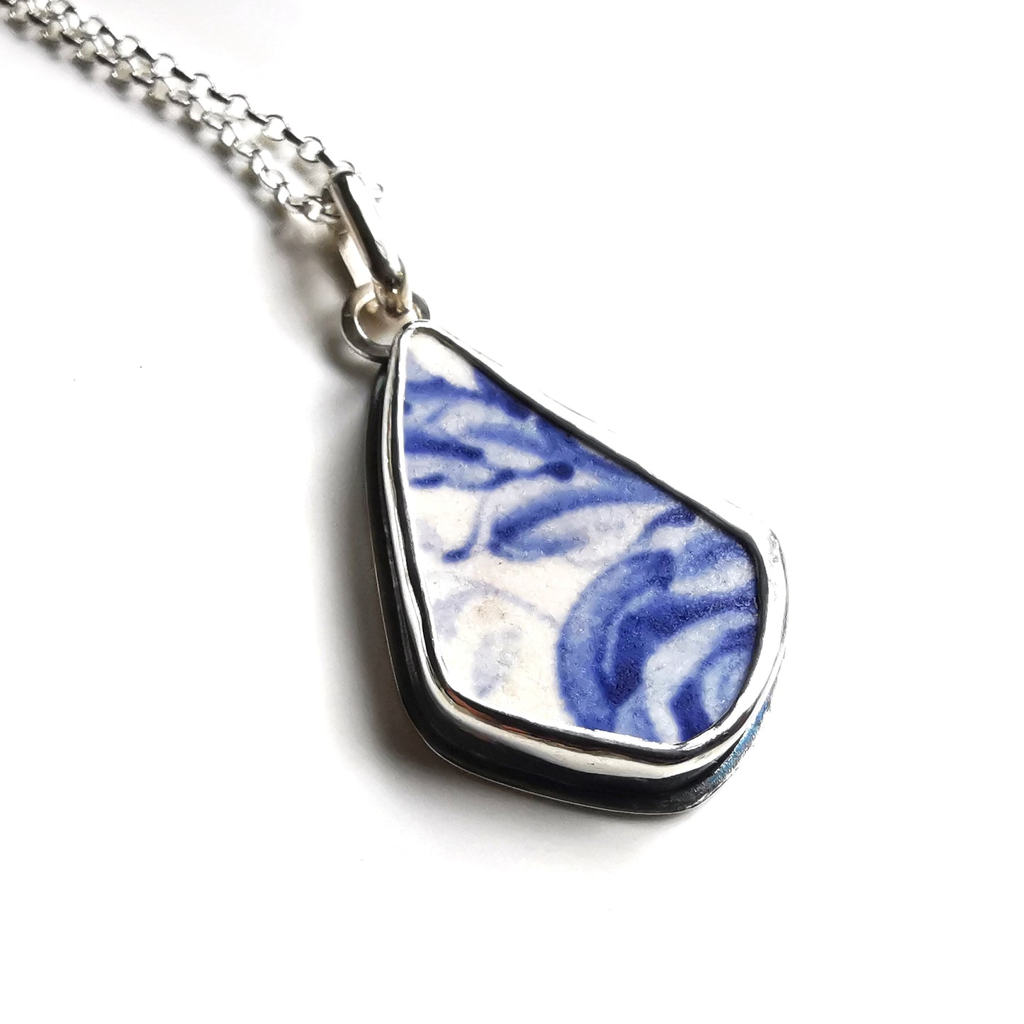 Scottish blue and white sea pottery & sterling silver pendant.