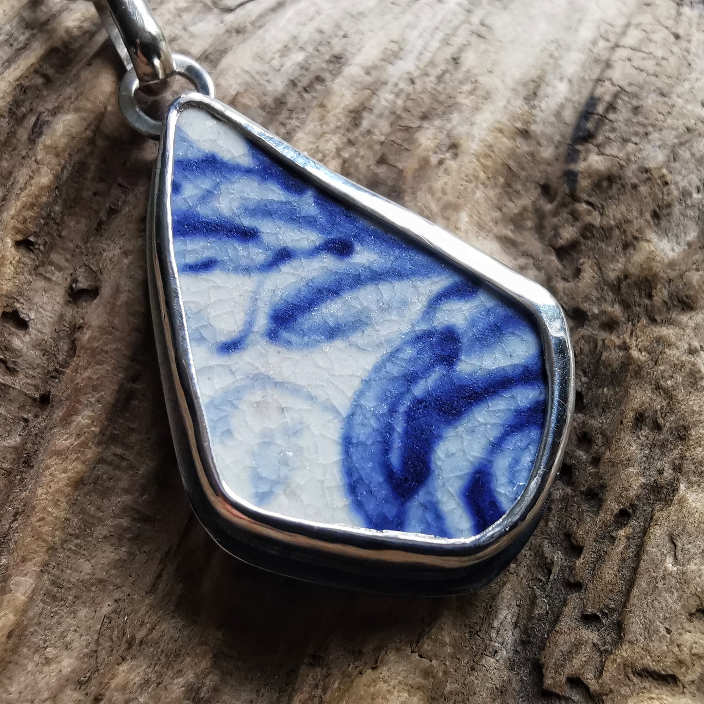 Scottish blue and white sea pottery & sterling silver pendant.