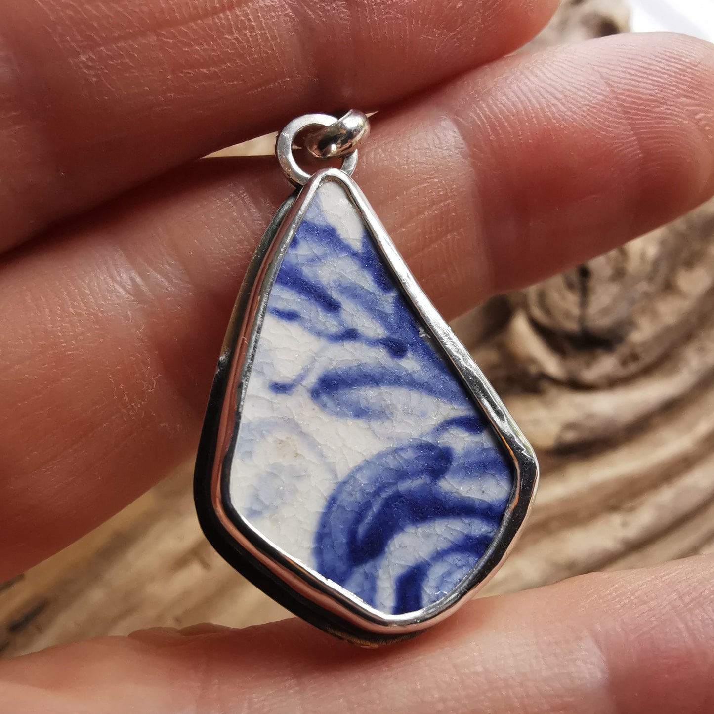 Scottish blue and white sea pottery & sterling silver pendant.