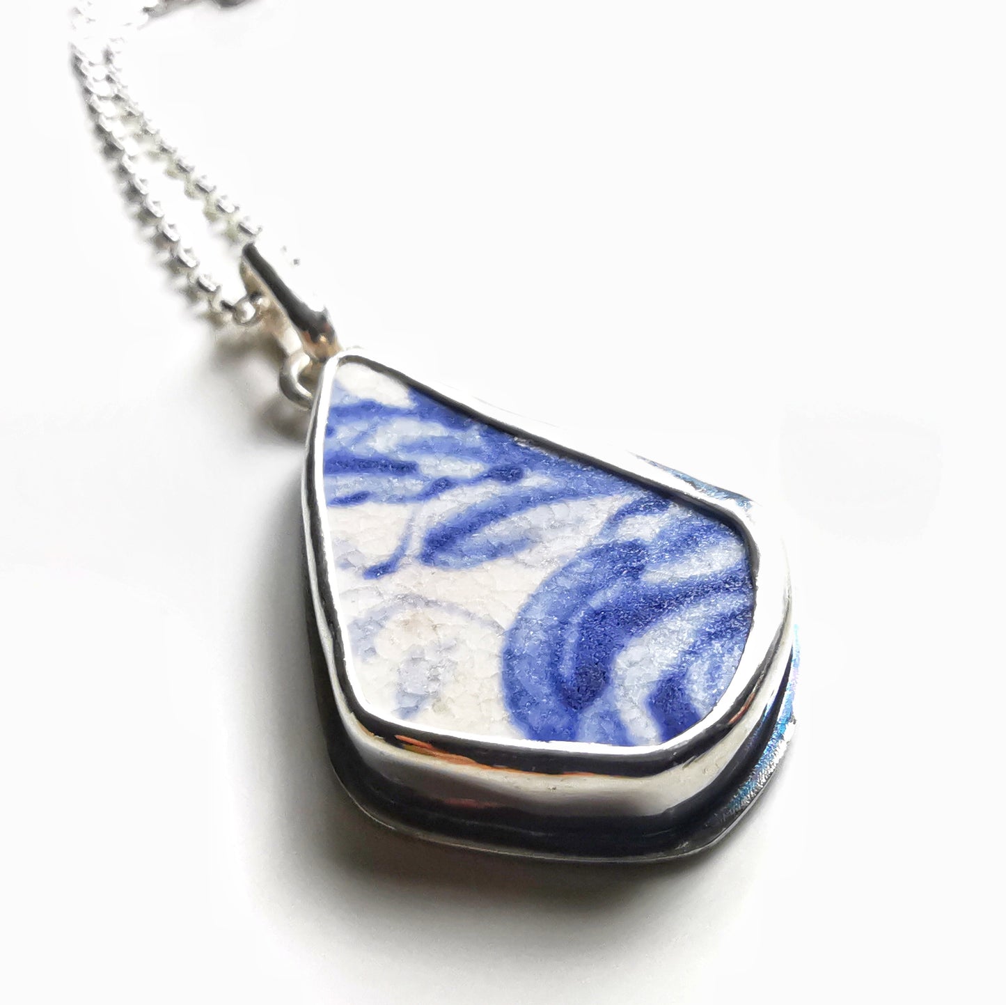 Scottish blue and white sea pottery & sterling silver pendant.