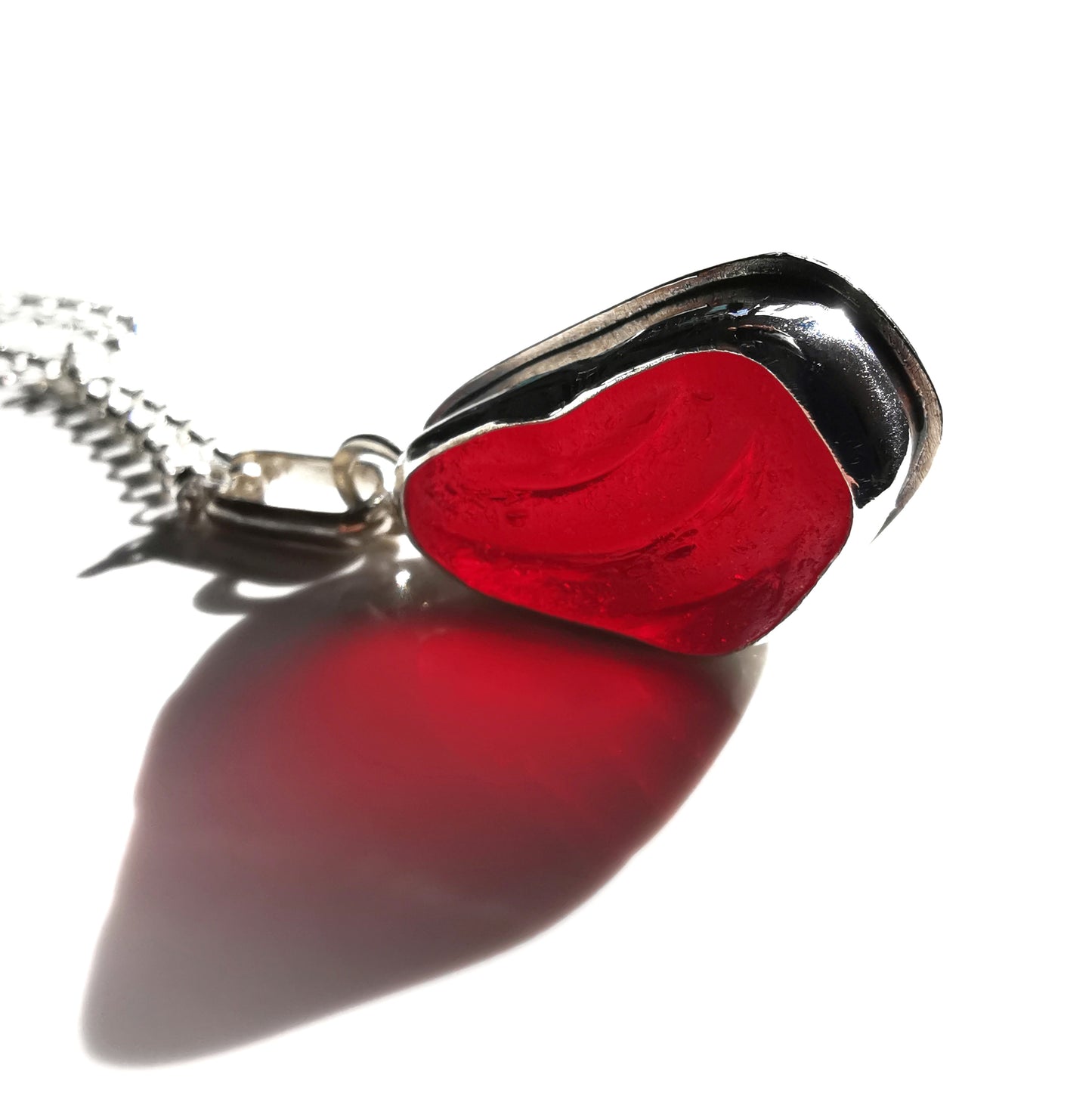 Red UV sea glass & sterling silver pendant.