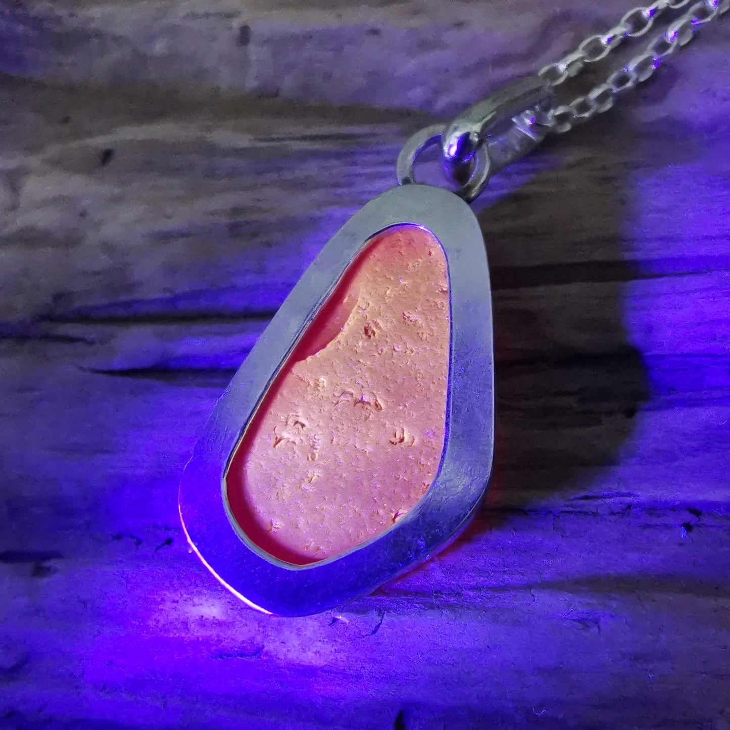 Red UV sea glass & sterling silver pendant.