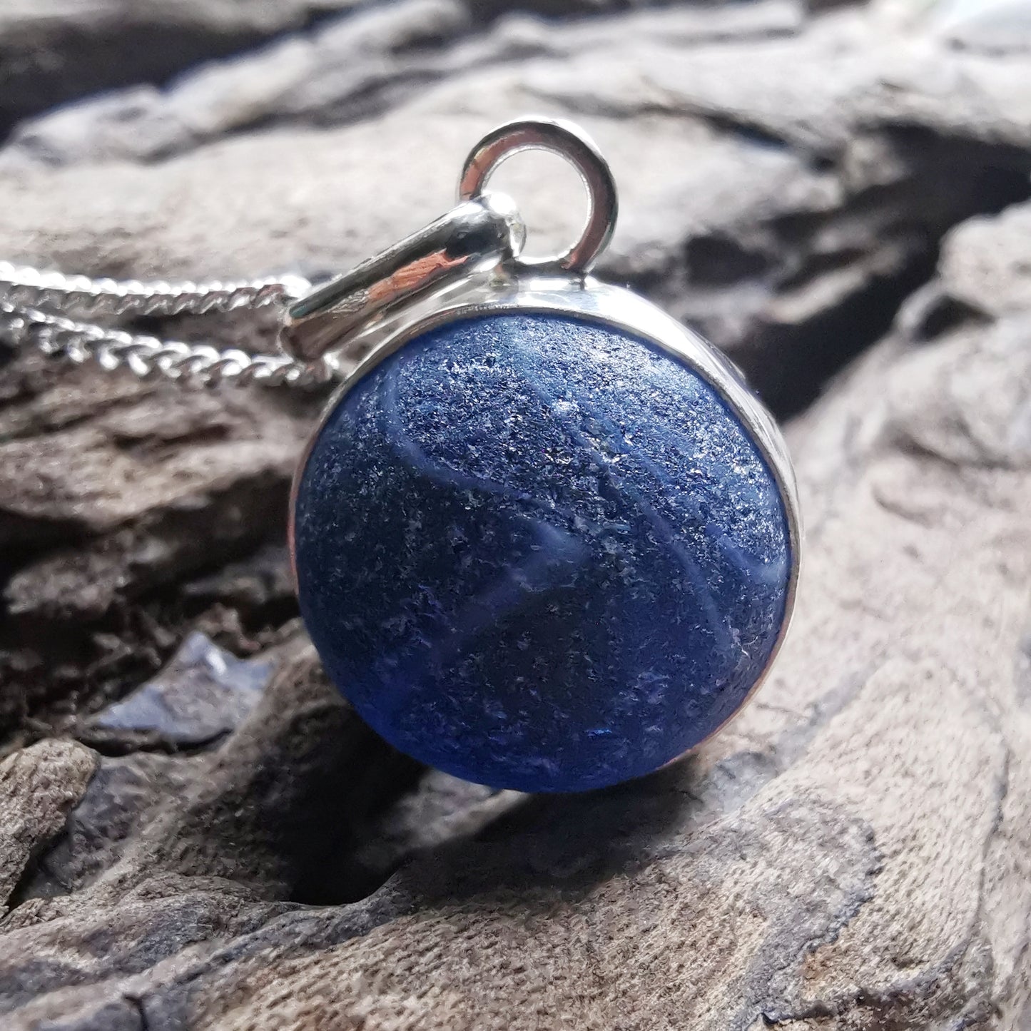 Scottish dark blue sea glass marble & sterling silver pendant.