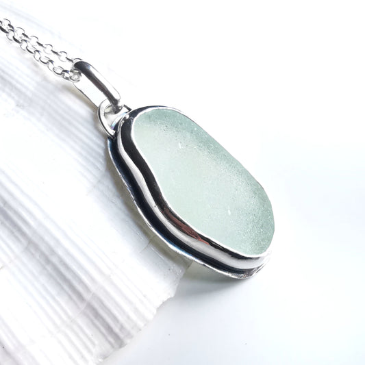 Custom made for Gillian. Seafoam sea glass & sterling silver pendant.