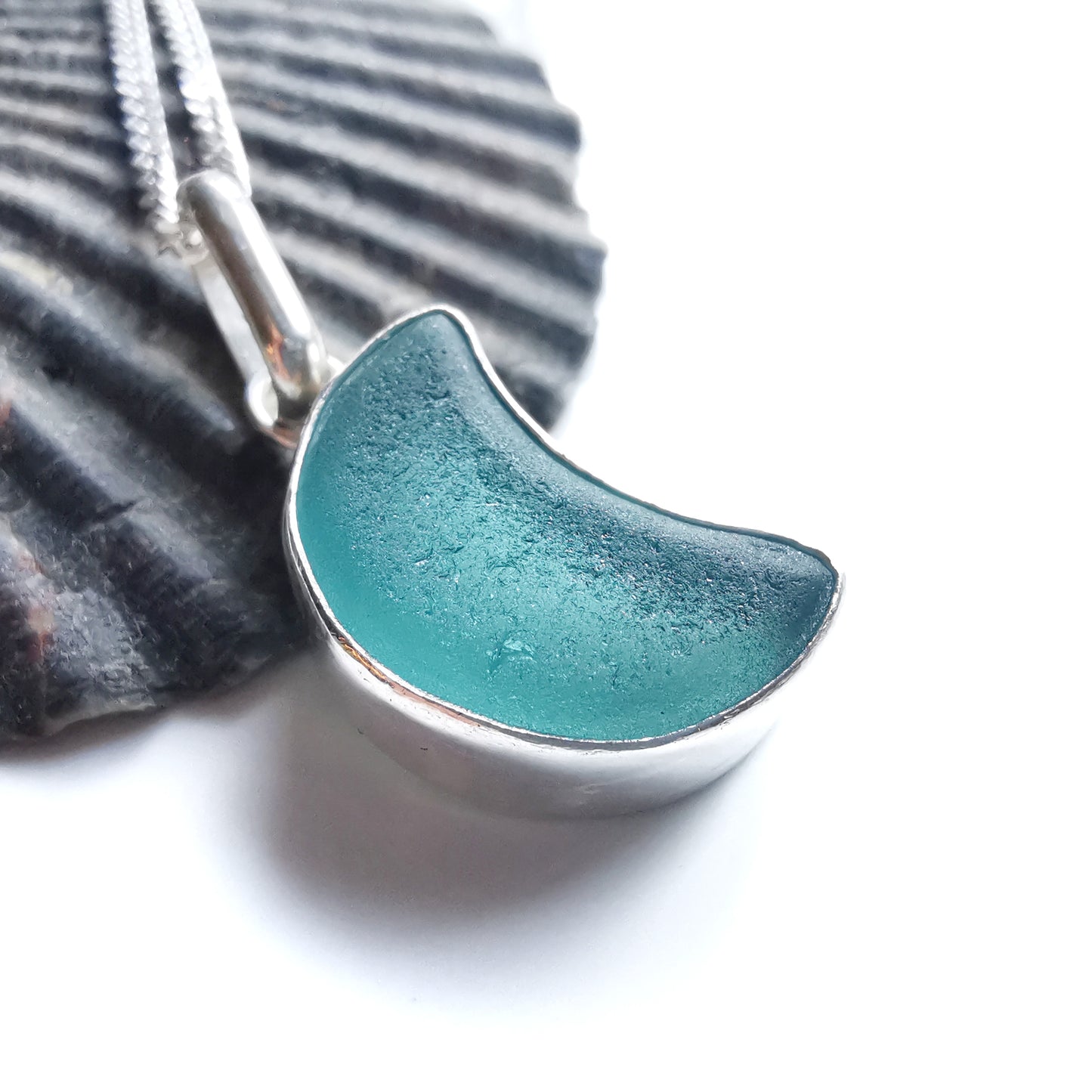 Scottish teal blue crescent moon sea glass & sterling silver pendant.