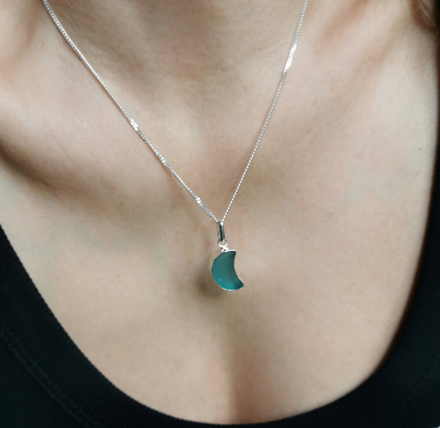 Scottish teal blue crescent moon sea glass & sterling silver pendant.