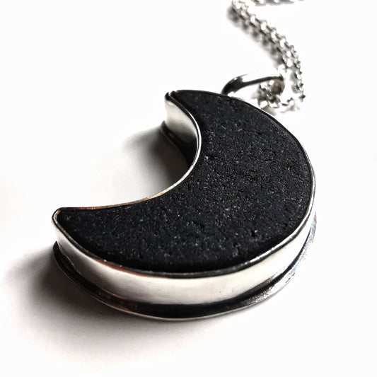 Scottish black crescent moon sea glass & sterling silver pendant.