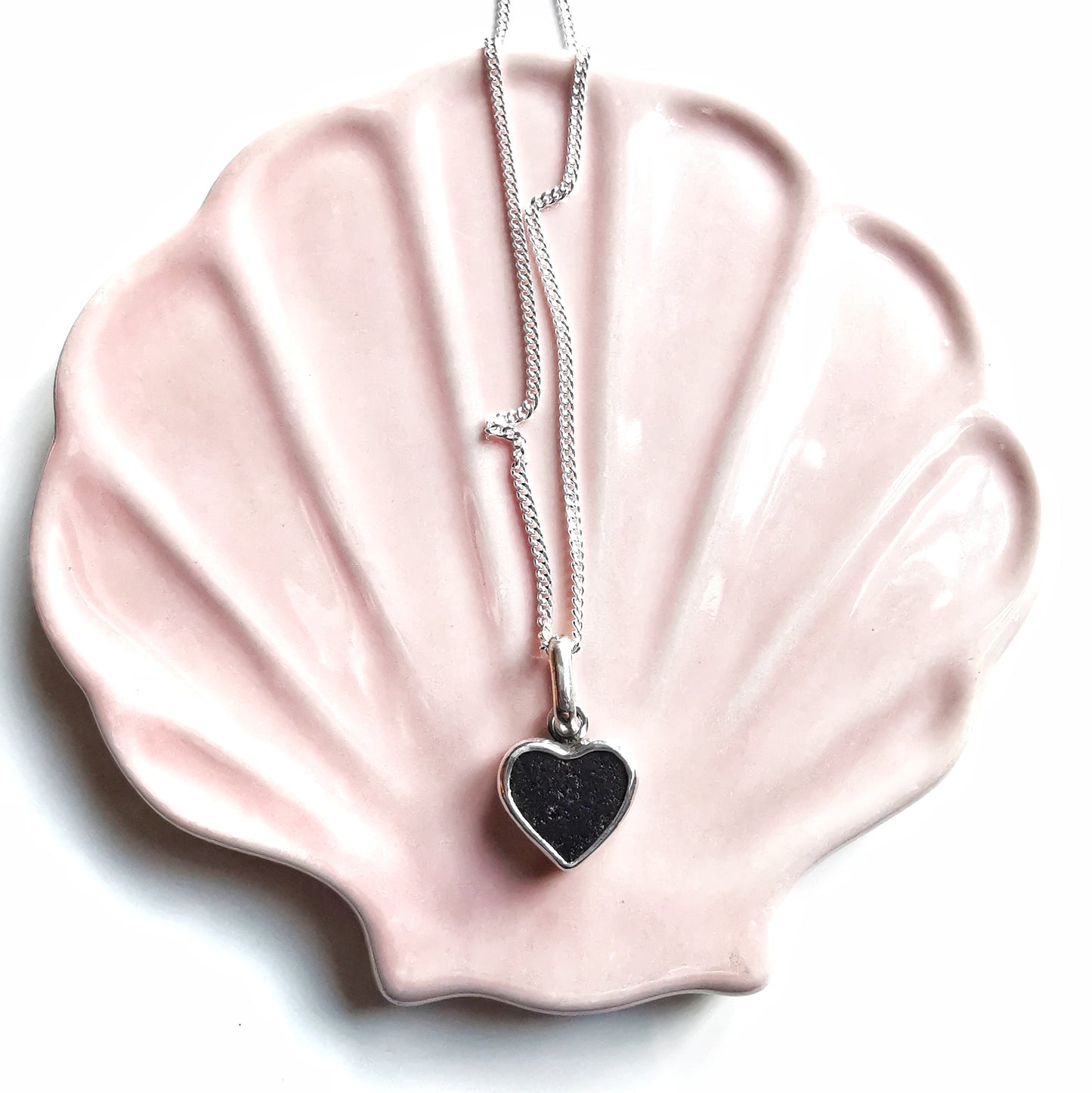 Tiny black Scottish sea glass heart & sterling silver pendant.