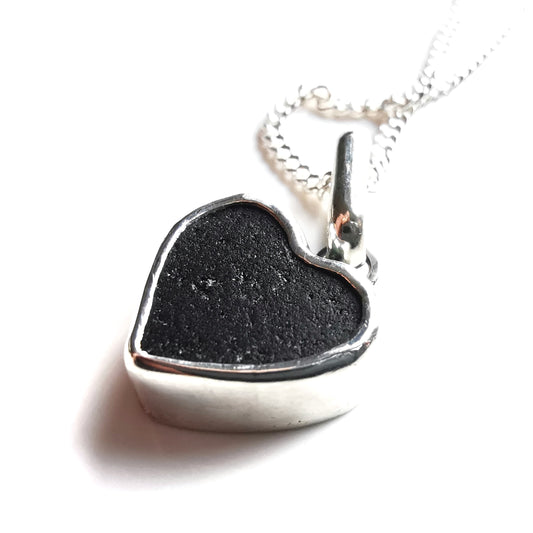 Tiny black Scottish sea glass heart & sterling silver pendant.