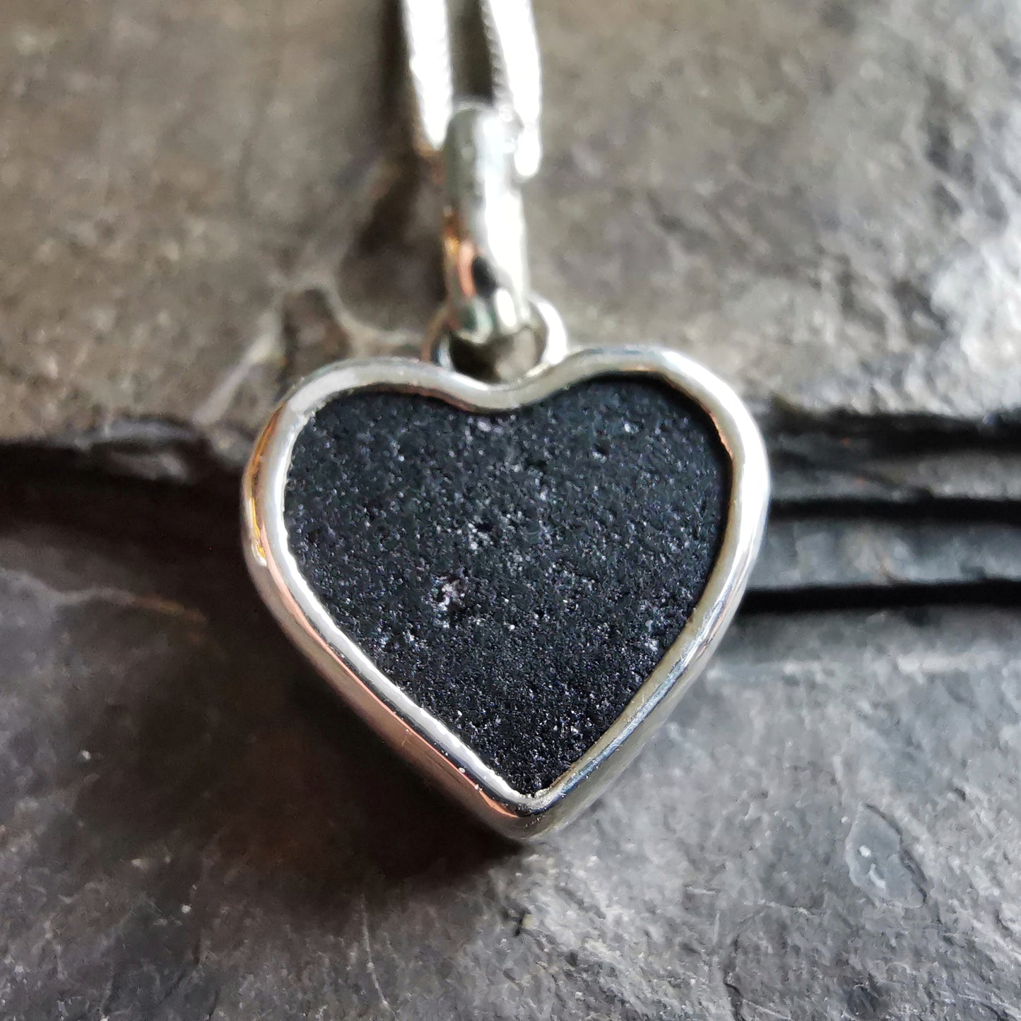 Tiny black Scottish sea glass heart & sterling silver pendant.