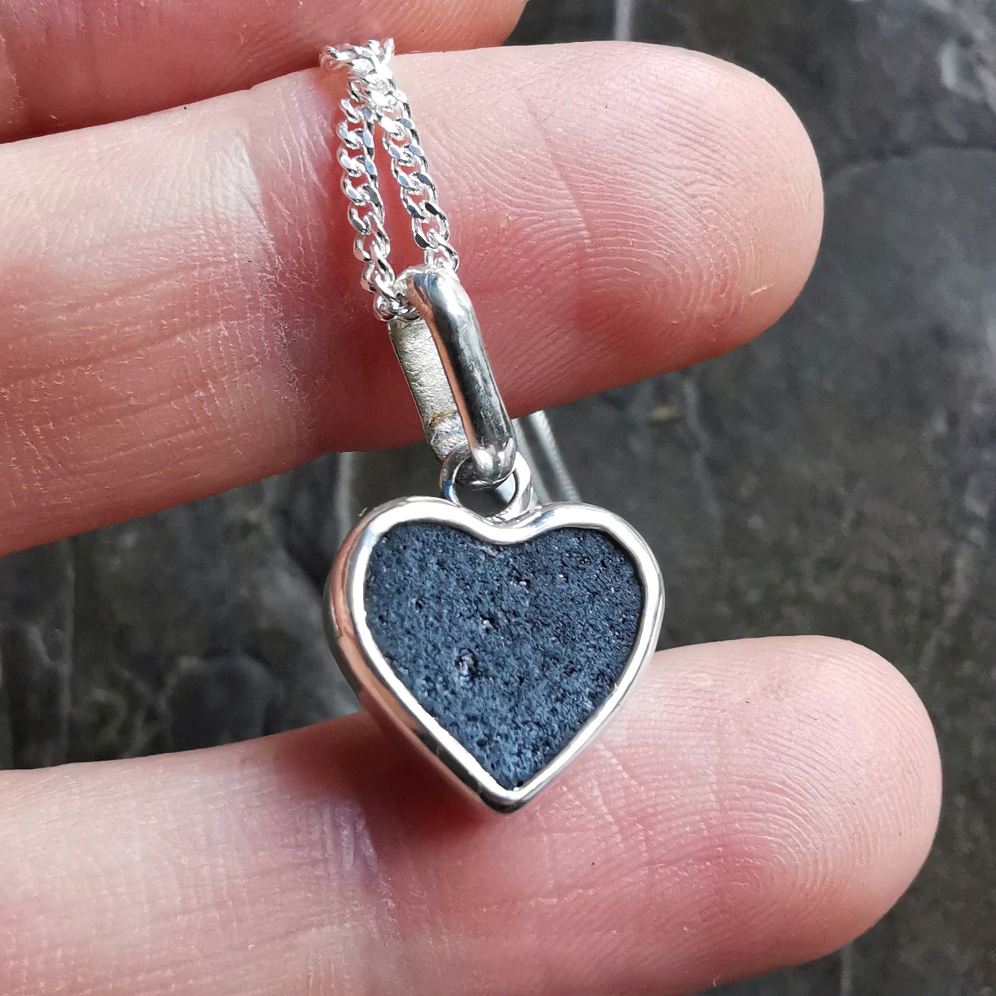 Tiny black Scottish sea glass heart & sterling silver pendant.