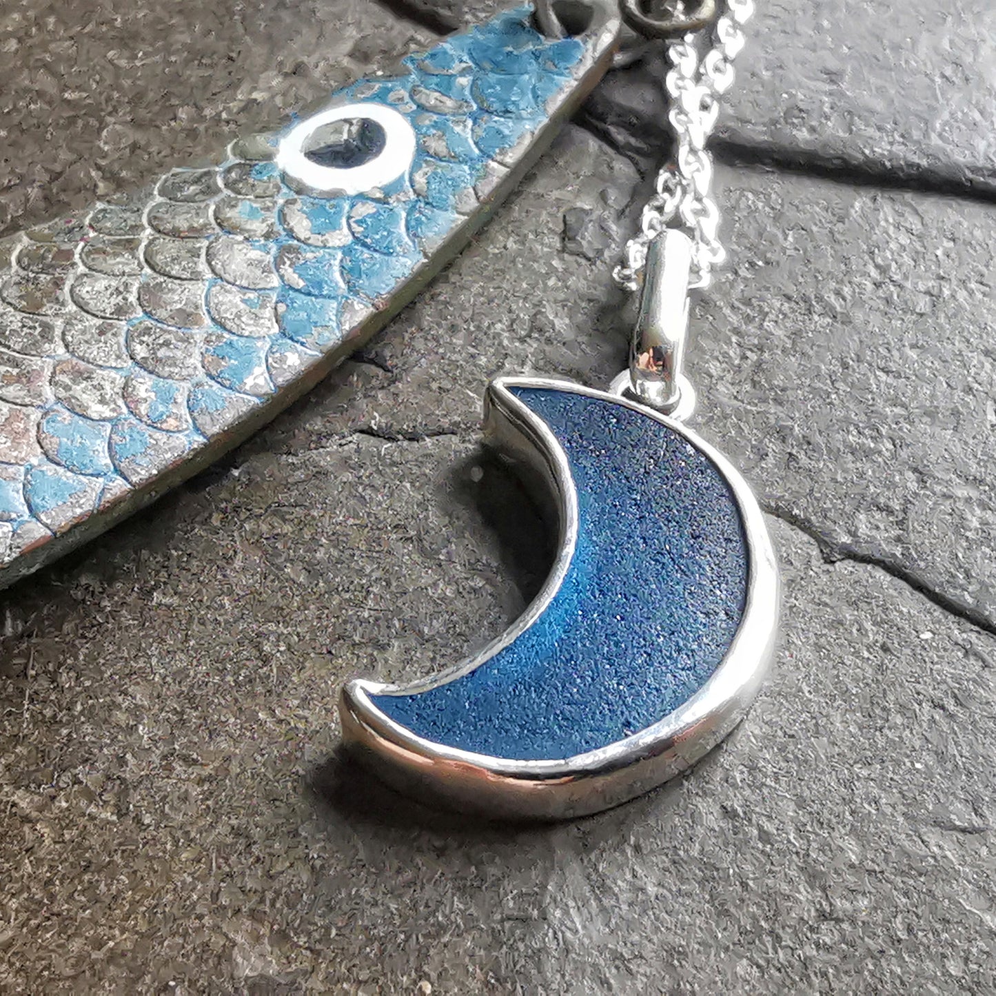 Scottish teal blue crescent moon sea glass & sterling silver pendant.