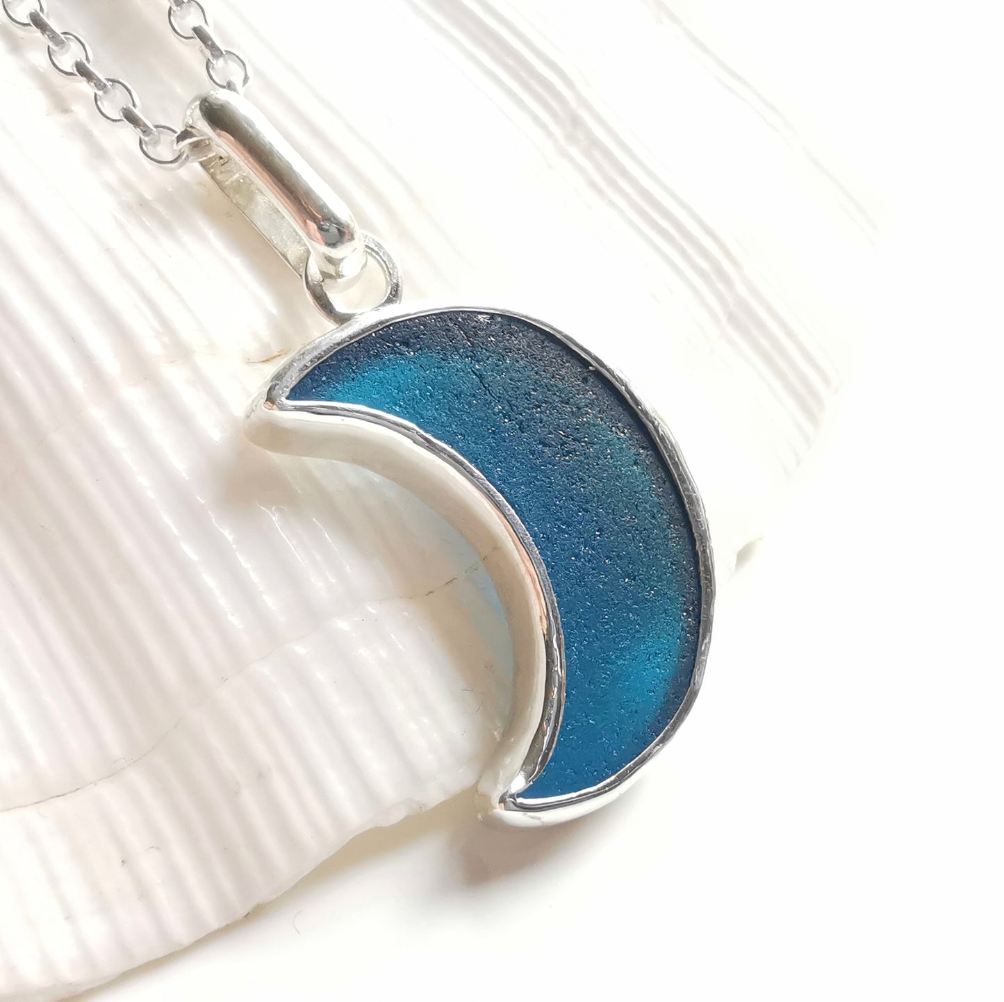 Scottish teal blue crescent moon sea glass & sterling silver pendant.