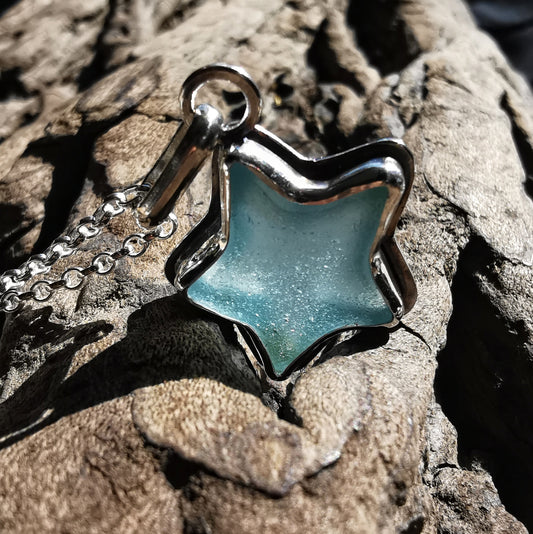 Reserved for Lesley. Scottish blue sea glass star & sterling silver pendant.