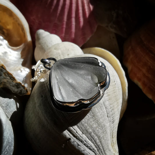 Reserved for Kerry. Scottish clear sea glass shell & sterling silver pendant.