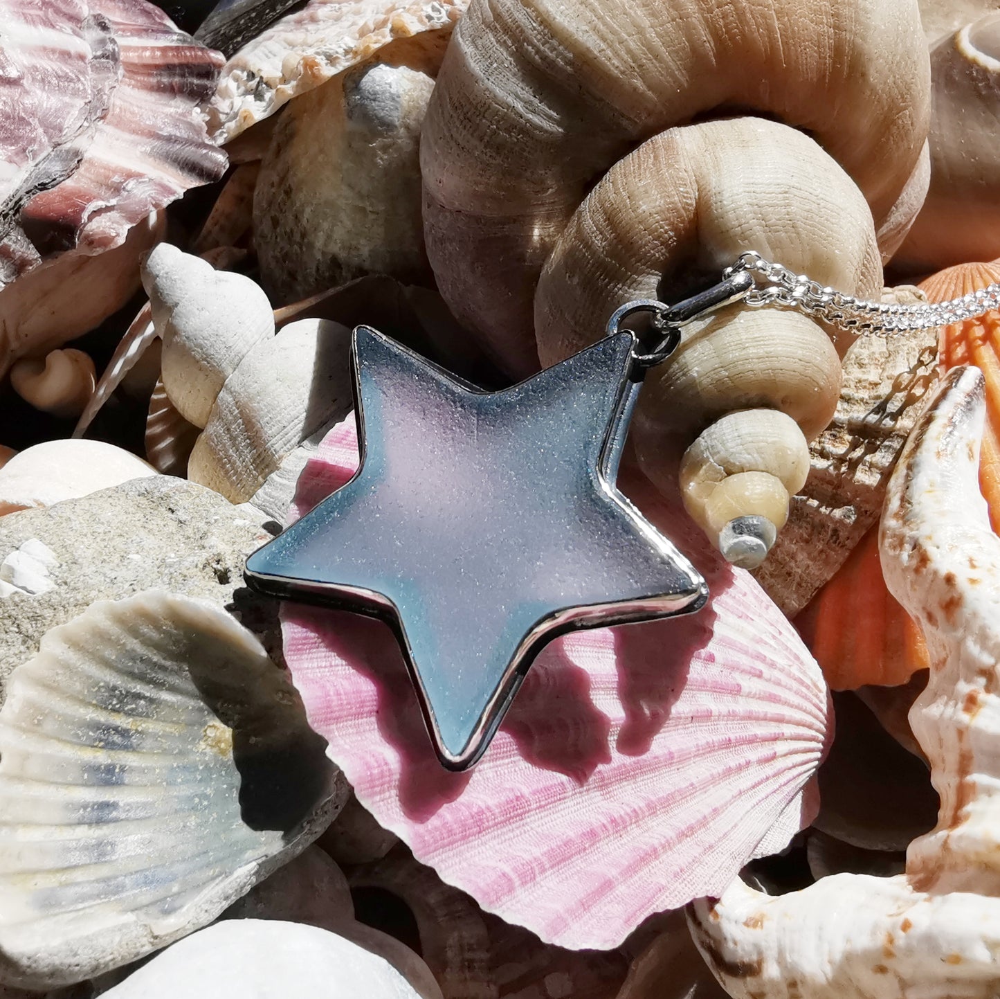 Scottish blue sea glass star & sterling silver pendant.