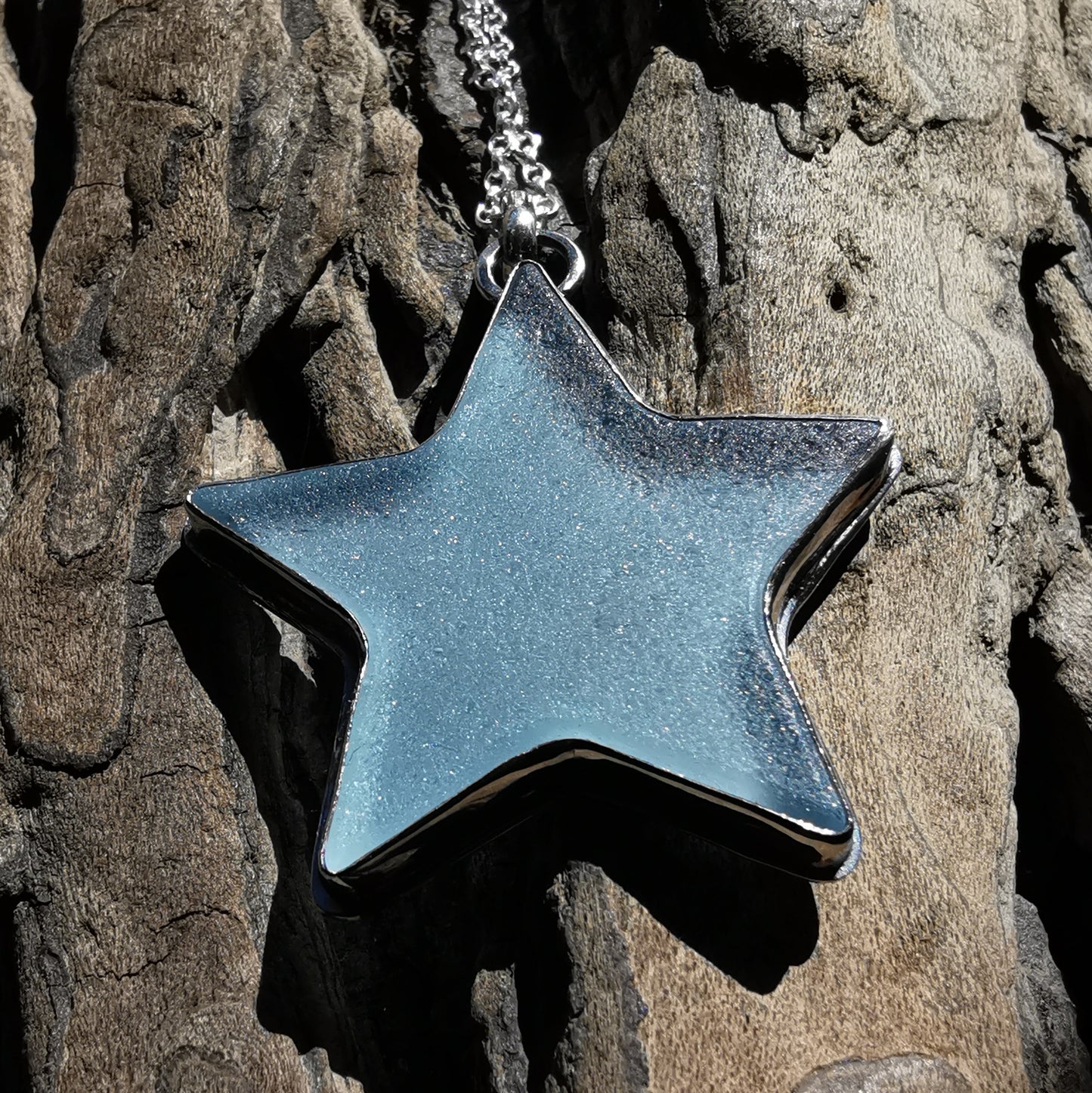 Scottish blue sea glass star & sterling silver pendant.