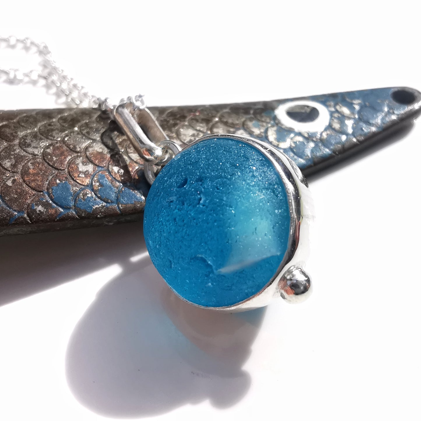 Aqua blue sea glass marble & sterling silver pendant.
