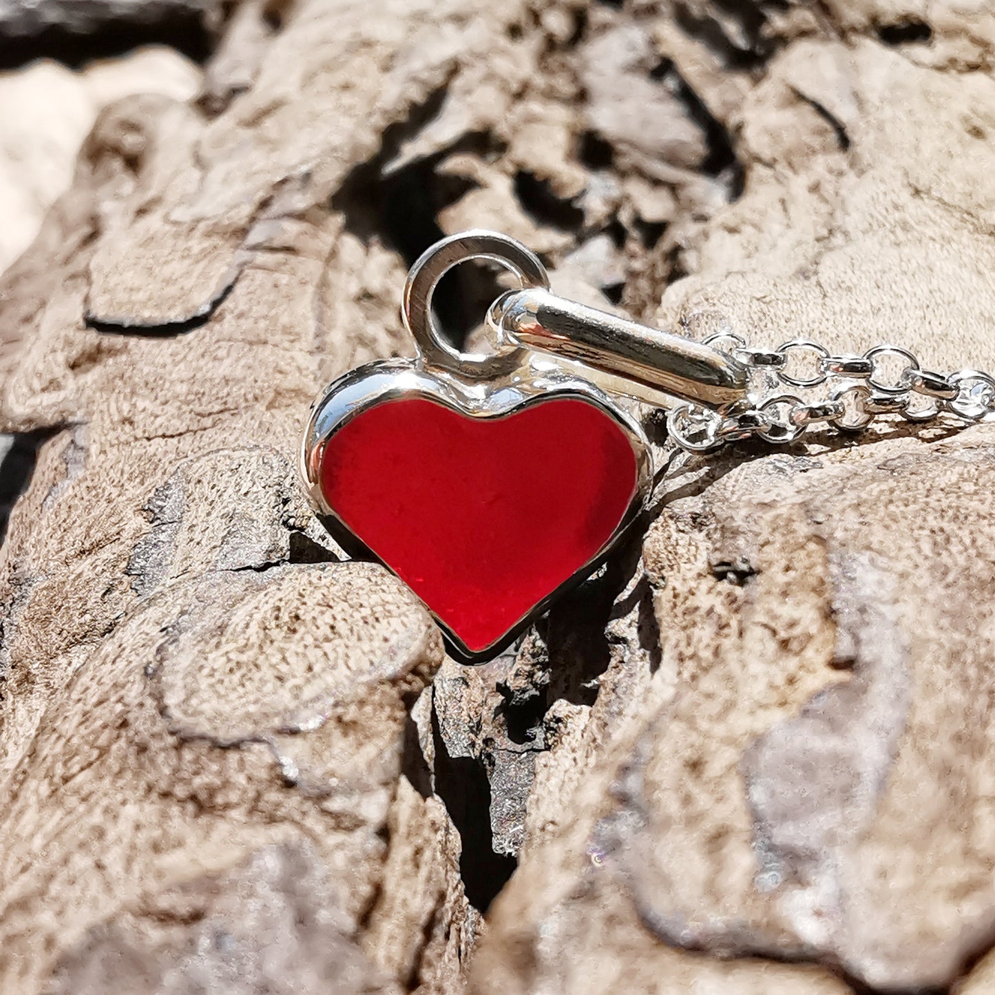 Scottish red sea glass heart & sterling silver pendant.
