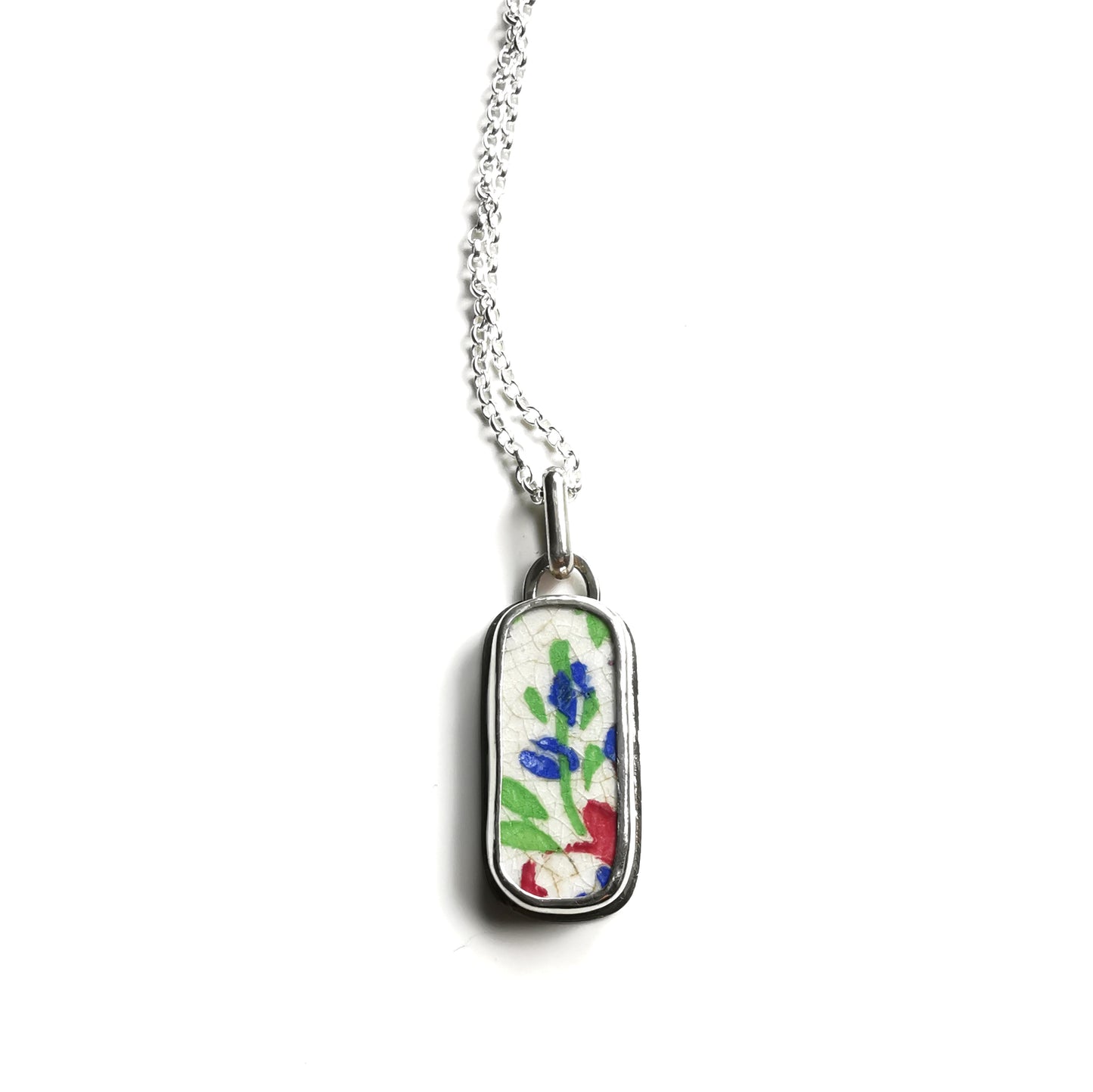 Scottish foliage pattern sea pottery & sterling silver pendant.