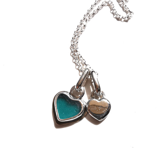 Scottish teal sea glass & sterling silver heart pendants.