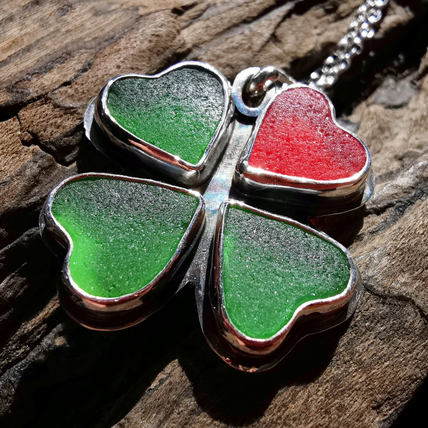 Four leaf clover, sea glass hearts & sterling silver pendant.