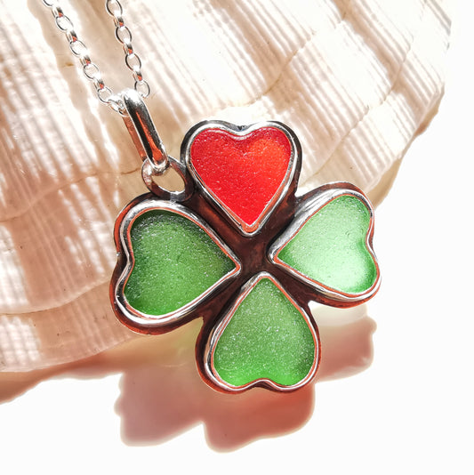 Four leaf clover, sea glass hearts & sterling silver pendant.