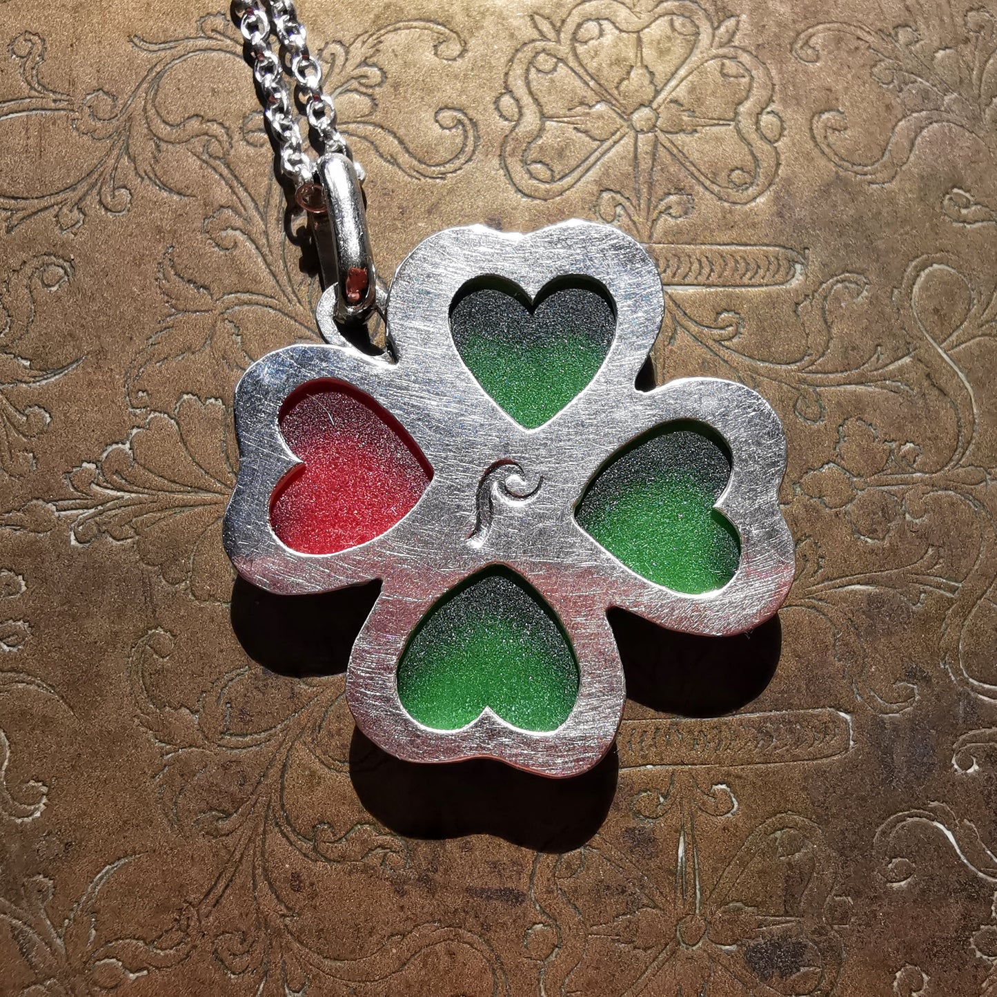 Four leaf clover, sea glass hearts & sterling silver pendant.