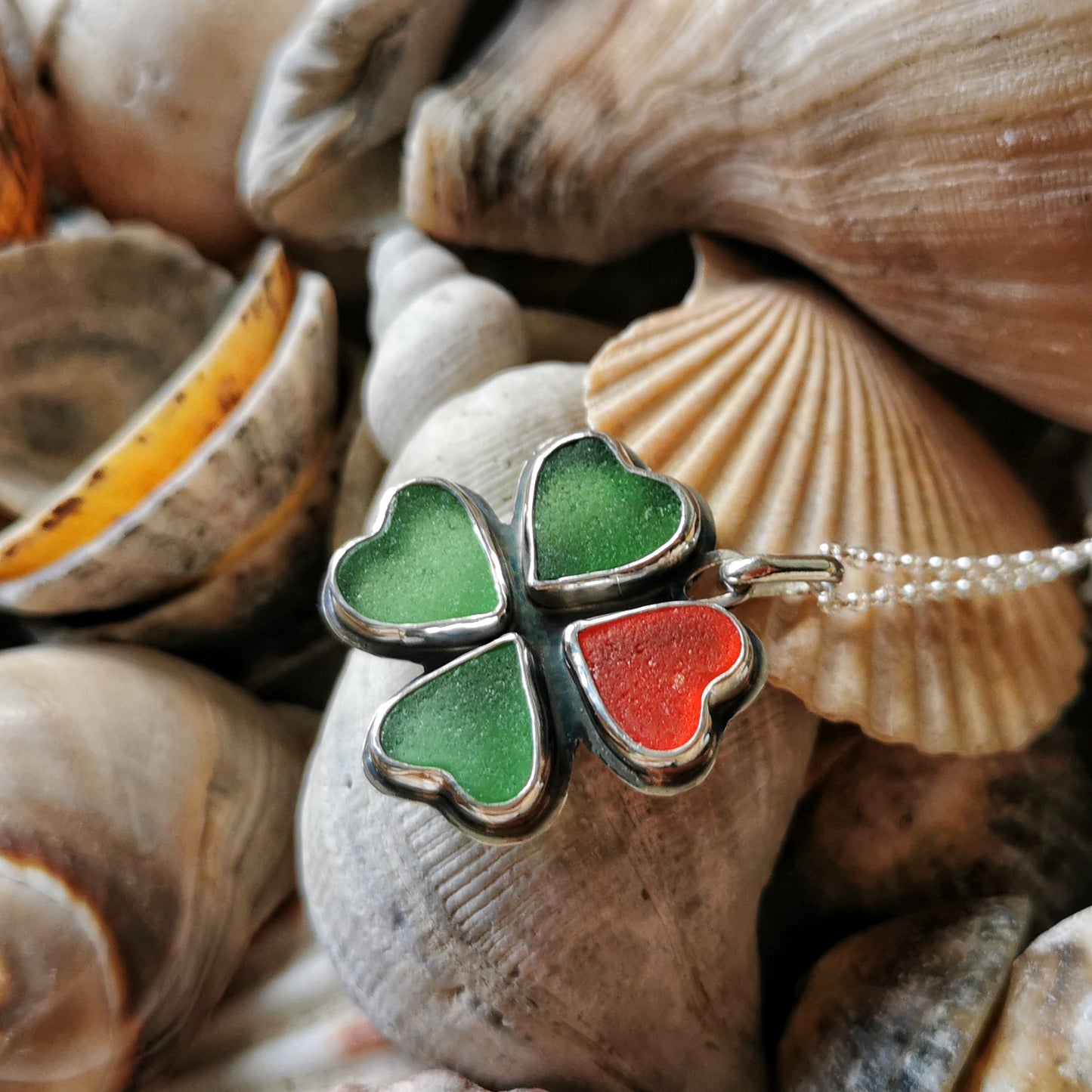 Four leaf clover, sea glass hearts & sterling silver pendant.