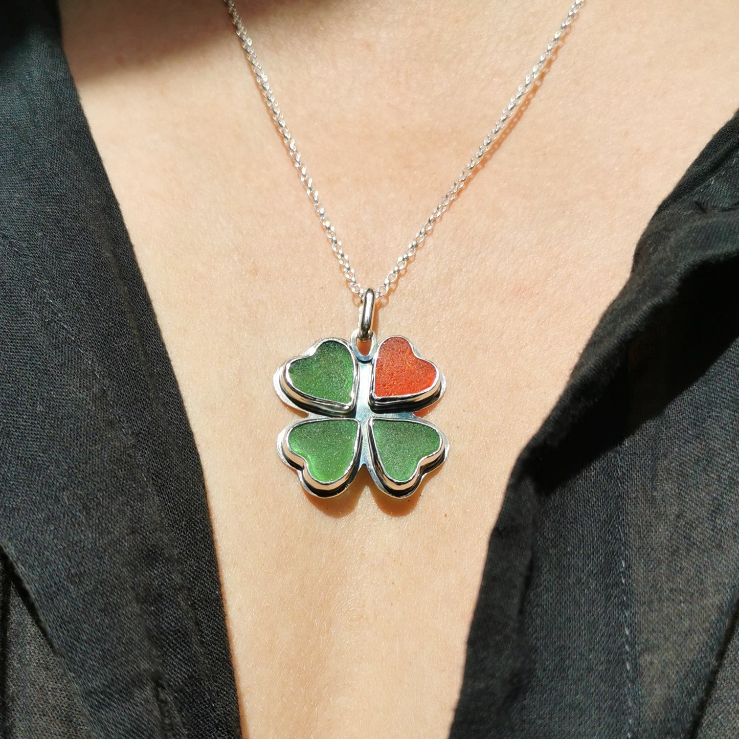 Four leaf clover, sea glass hearts & sterling silver pendant.