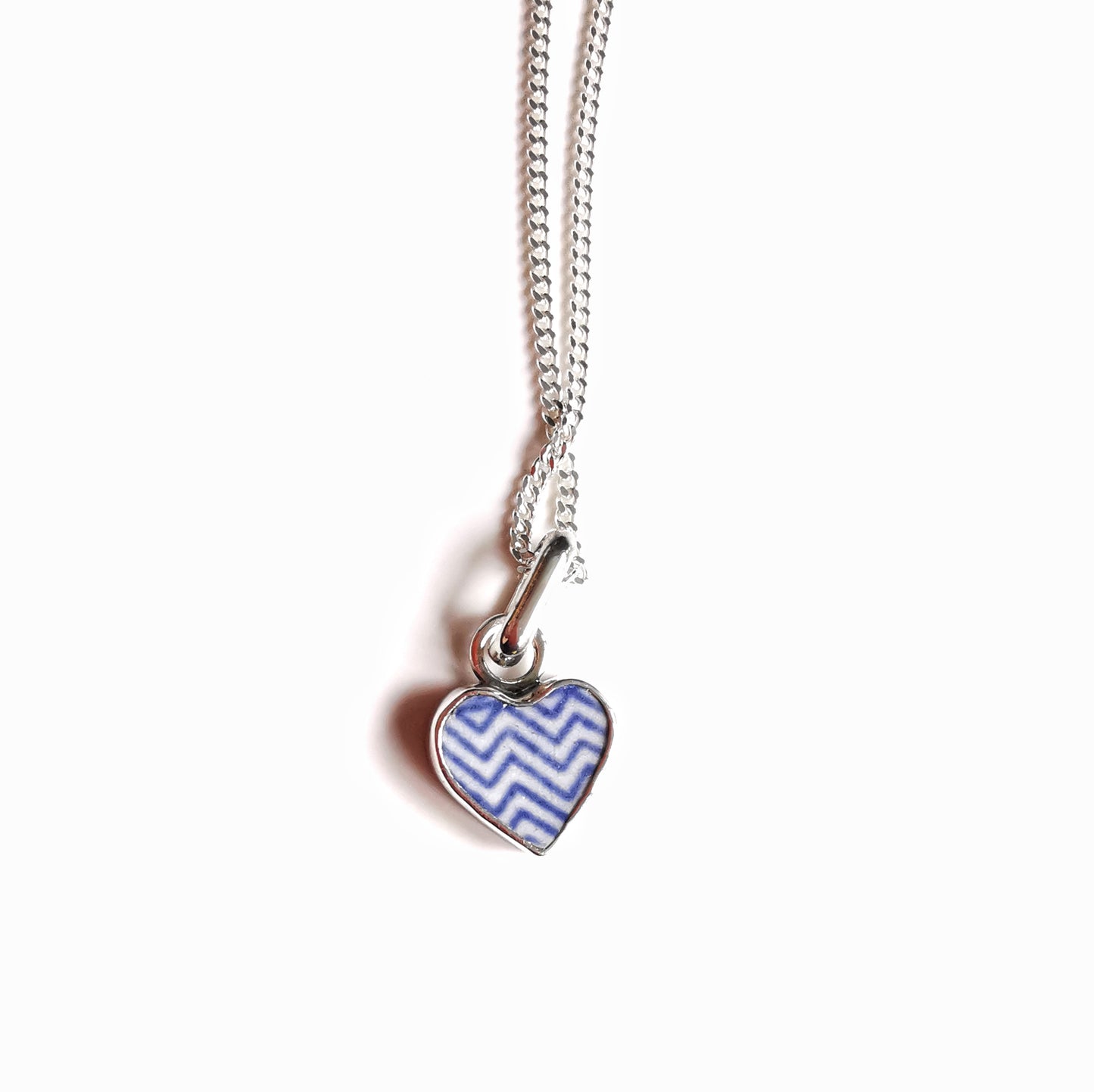 Scottish beach pottery necklace -blue and white chevron pattern, sterling silver heart pendant.