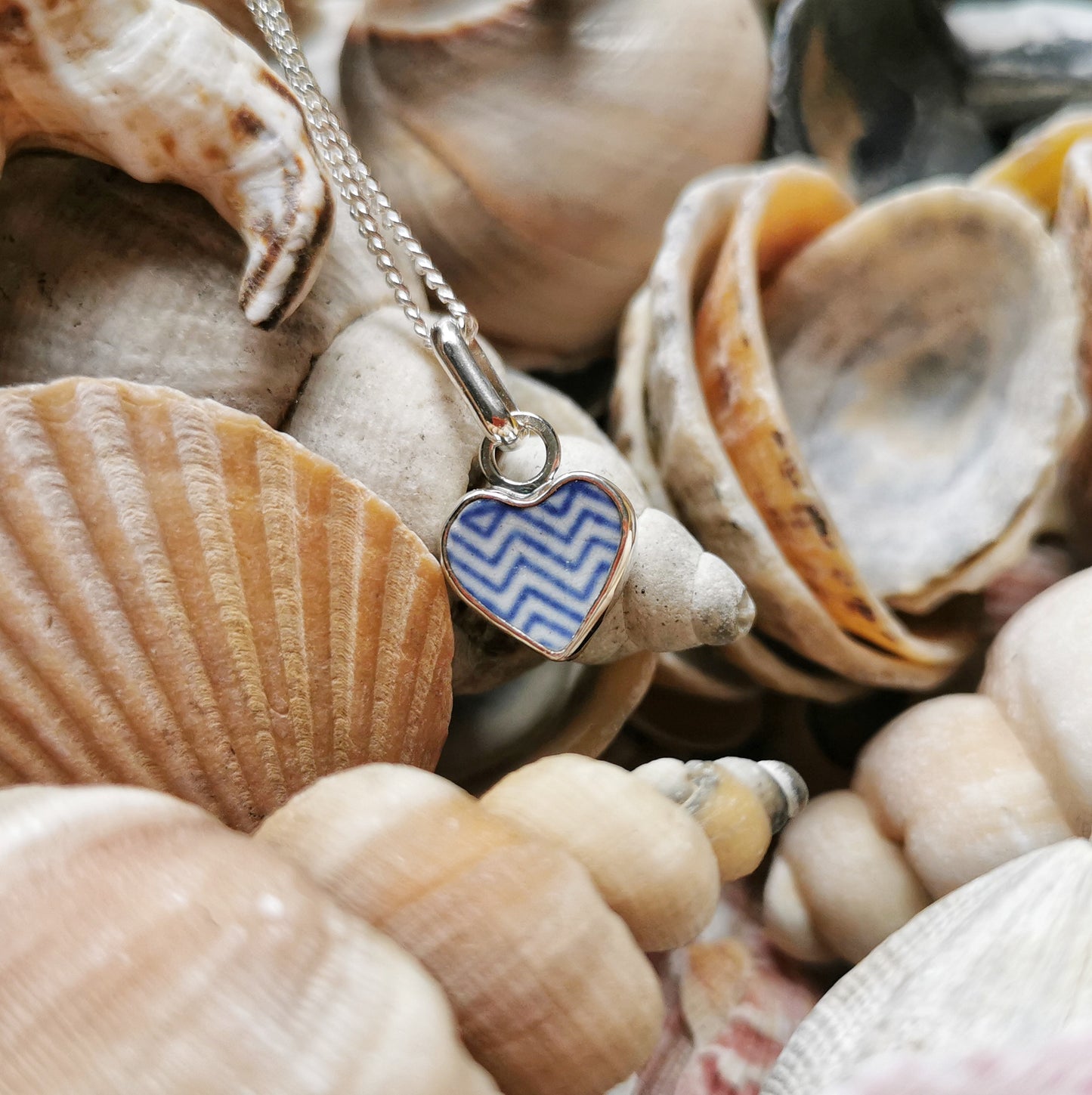 Scottish beach pottery necklace -blue and white chevron pattern, sterling silver heart pendant.